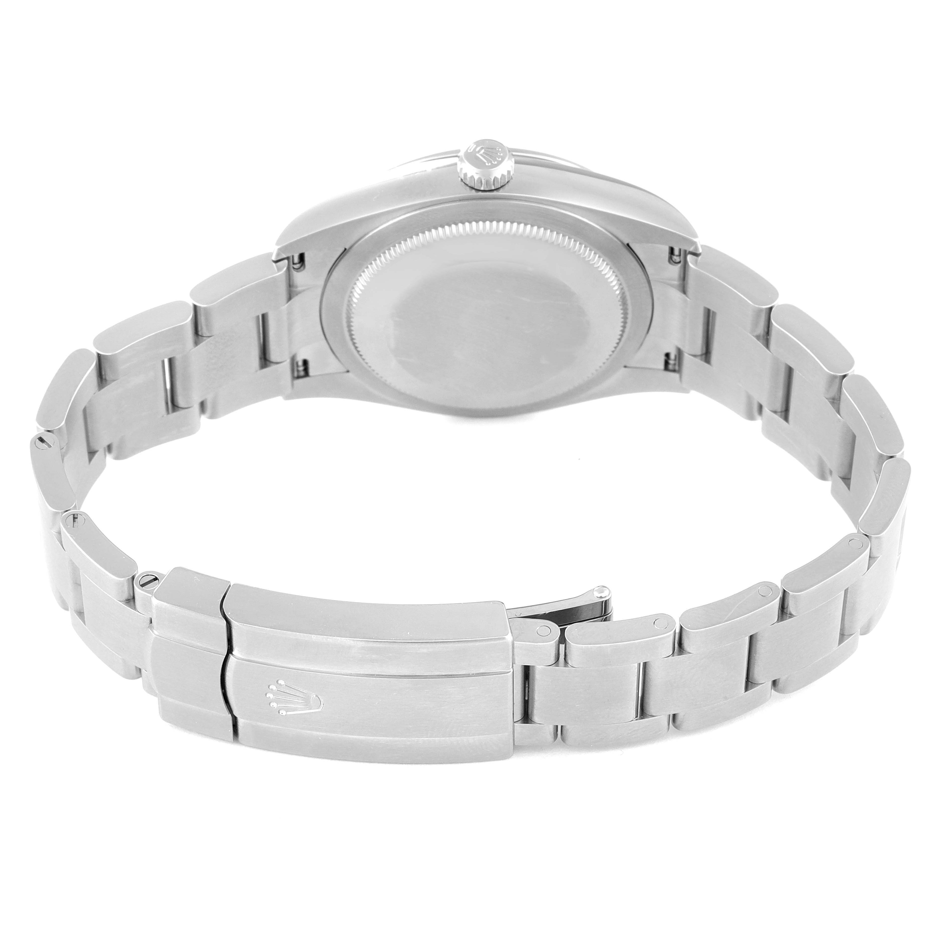 The Rolex Oyster Perpetual 124200 Men's Stainless Steel Blue Dial 124200 Men's Stainless Steel Blue Dial watch is shown from the back, displaying the closed clasp and stainless steel bracelet.