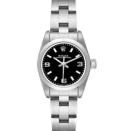The Rolex Oyster Perpetual 67180 Women's Stainless Steel Black Dial watch is shown from a top-down angle, displaying its black dial, stainless steel bracelet, and bezel.
