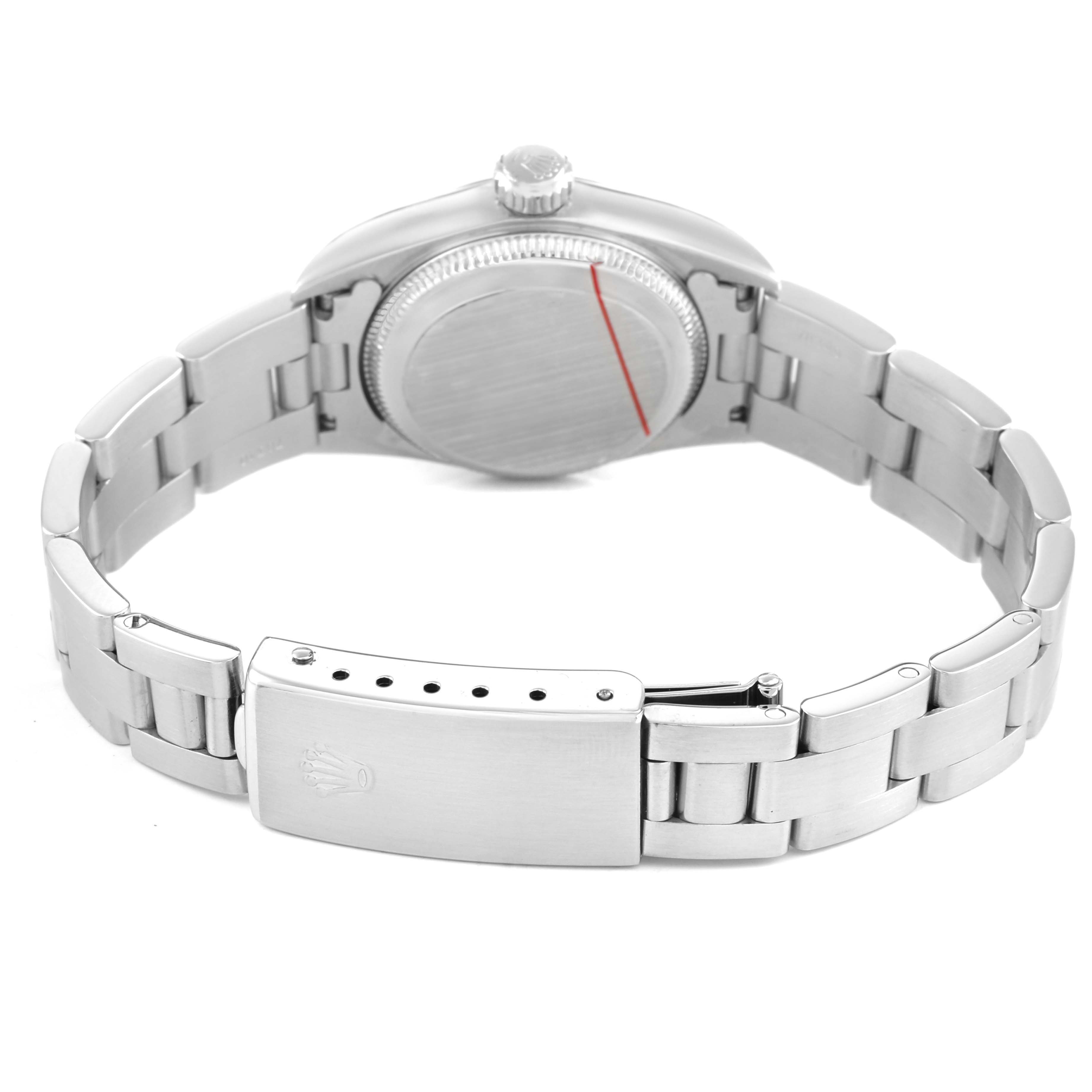 The Rolex Oyster Perpetual 67180 Women's Stainless Steel Black Dial watch is shown from the back, highlighting the case back, bracelet, and clasp.