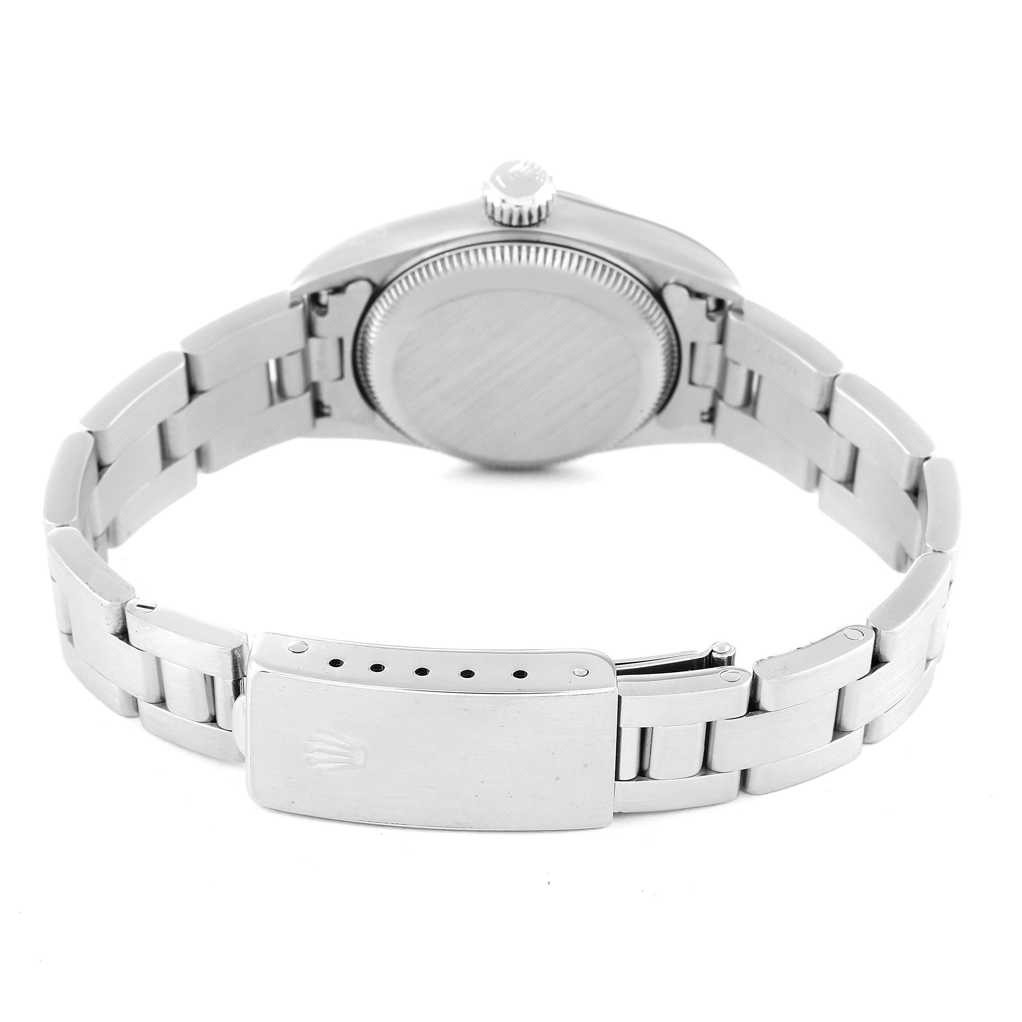 This image shows the back view of the Rolex Oyster Perpetual 67180 Women's Stainless Steel Blue Dial 67180 Women's Stainless Steel Blue Dial watch, highlighting its case back and bracelet clasp.