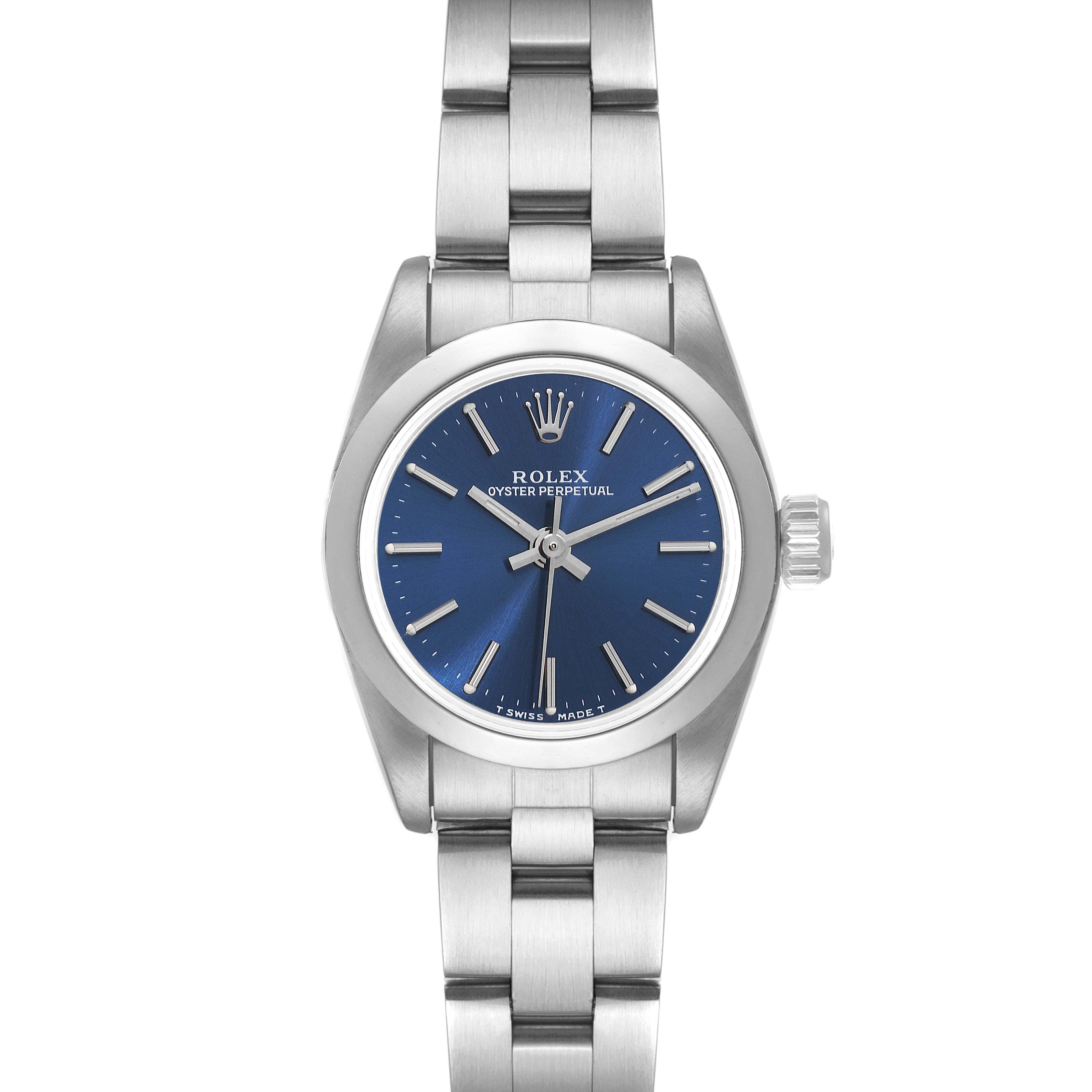The image shows a front view of the Rolex Oyster Perpetual 67180 Women's Stainless Steel Blue Dial 67180 Women's Stainless Steel Blue Dial watch, highlighting its blue dial, hands, and stainless steel bracelet.