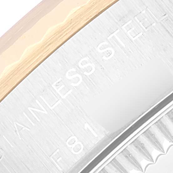 The image shows a close-up of the side of a Rolex Oyster Perpetual 76193 Women's Steel and Gold (two tone) Black Dial 76193 Women's Steel and Gold (two tone) Black Dial watch case highlighting its stainless steel construction.