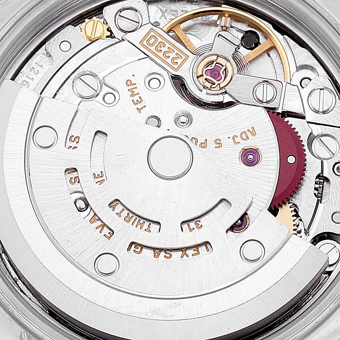 This is a close-up view of the movement inside a Rolex Oyster Perpetual 76193 Women's Steel and Gold (two tone) Black Dial 76193 Women's Steel and Gold (two tone) Black Dial watch, detailing the intricate mechanical components.