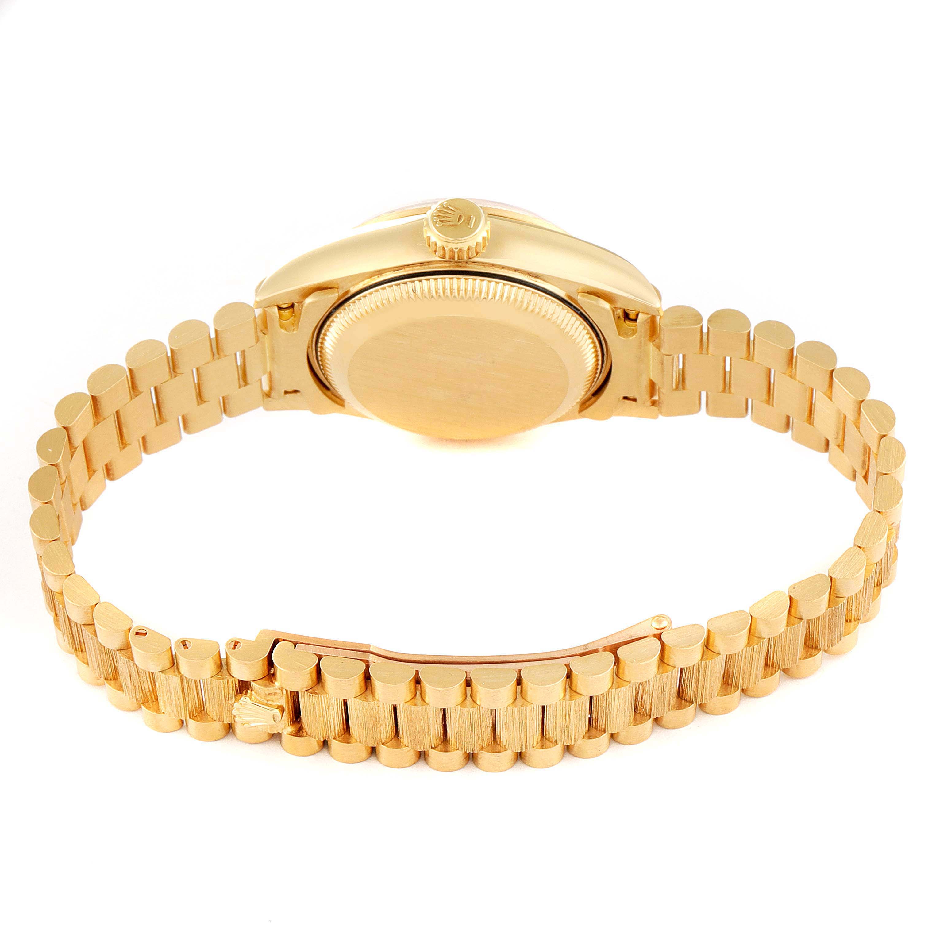 The image shows the back view of a Rolex President 69278 Women's Yellow Gold Champagne Dial 69278 Women's Yellow Gold Champagne Dial model watch, highlighting the case back, crown, and bracelet.