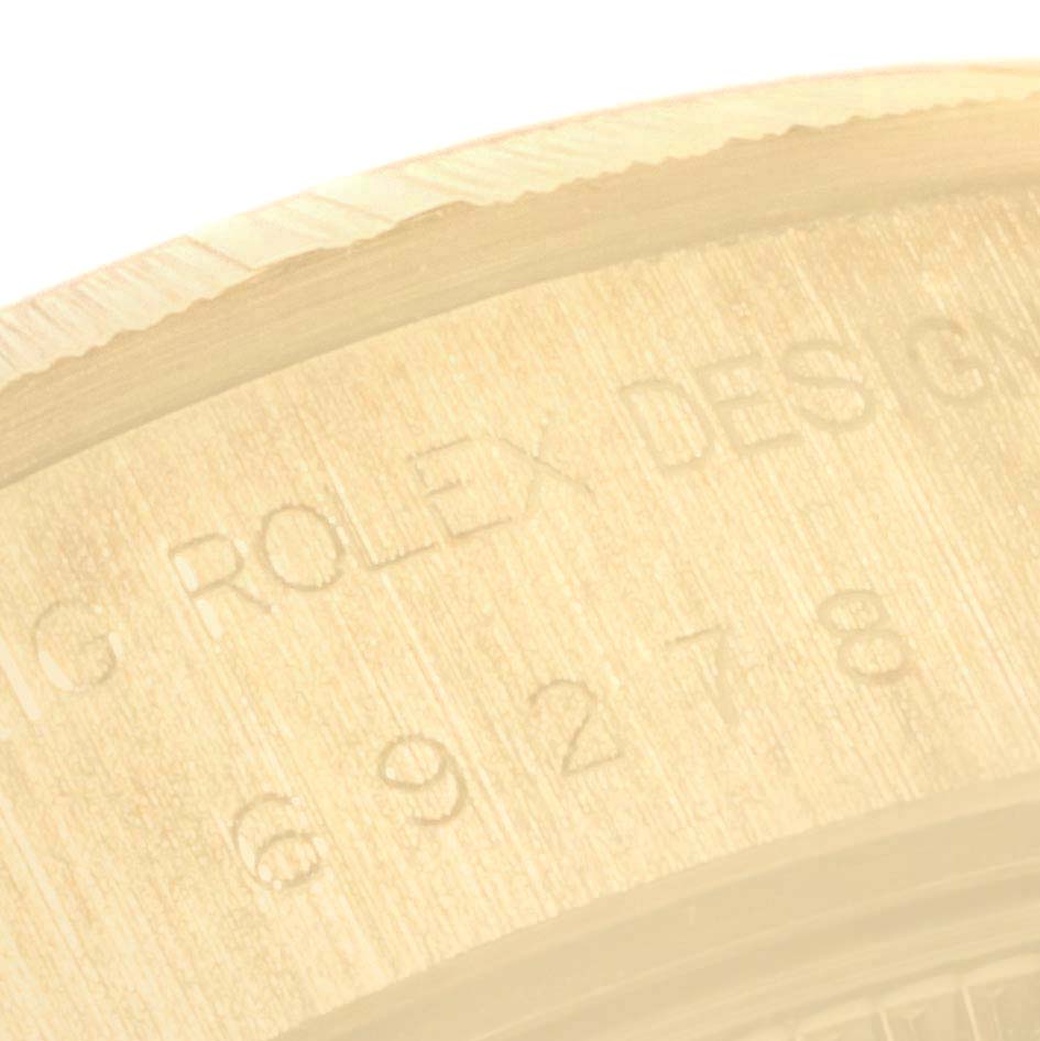 This image shows a close-up of the engraved case back's inner side for a Rolex President 69278 Women's Yellow Gold Champagne Dial 69278 Women's Yellow Gold Champagne Dial model watch.