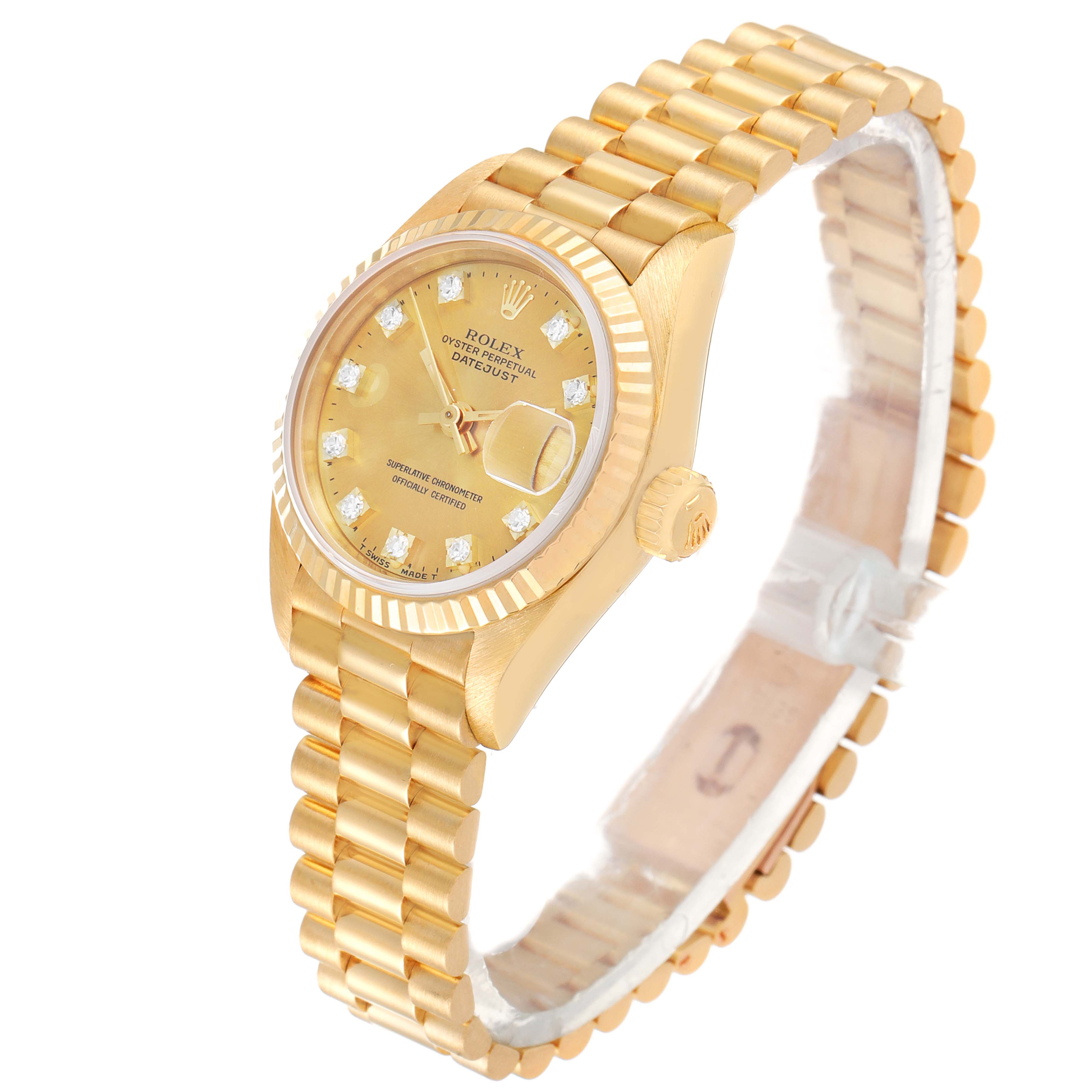 The image displays a Rolex President 69178 Women
s Yellow Gold Champagne Dial 69178 Women
s Yellow Gold Champagne Dial model watch, showing the gold case, diamond dial, fluted bezel, and bracelet band at a slight angle.