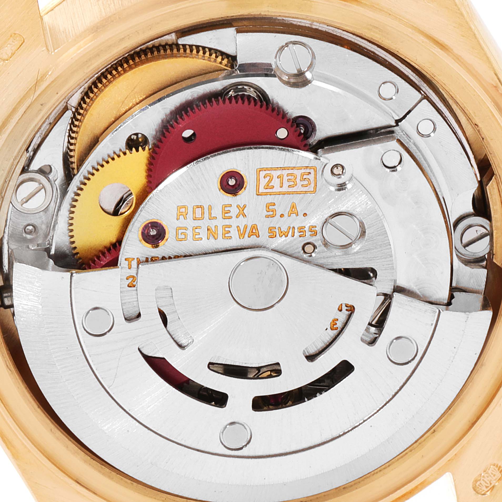 The image shows the inner mechanical components of the Rolex President 69178 Women
s Yellow Gold Champagne Dial 69178 Women
s Yellow Gold Champagne Dial model watch, highlighting its intricate gears and movement.