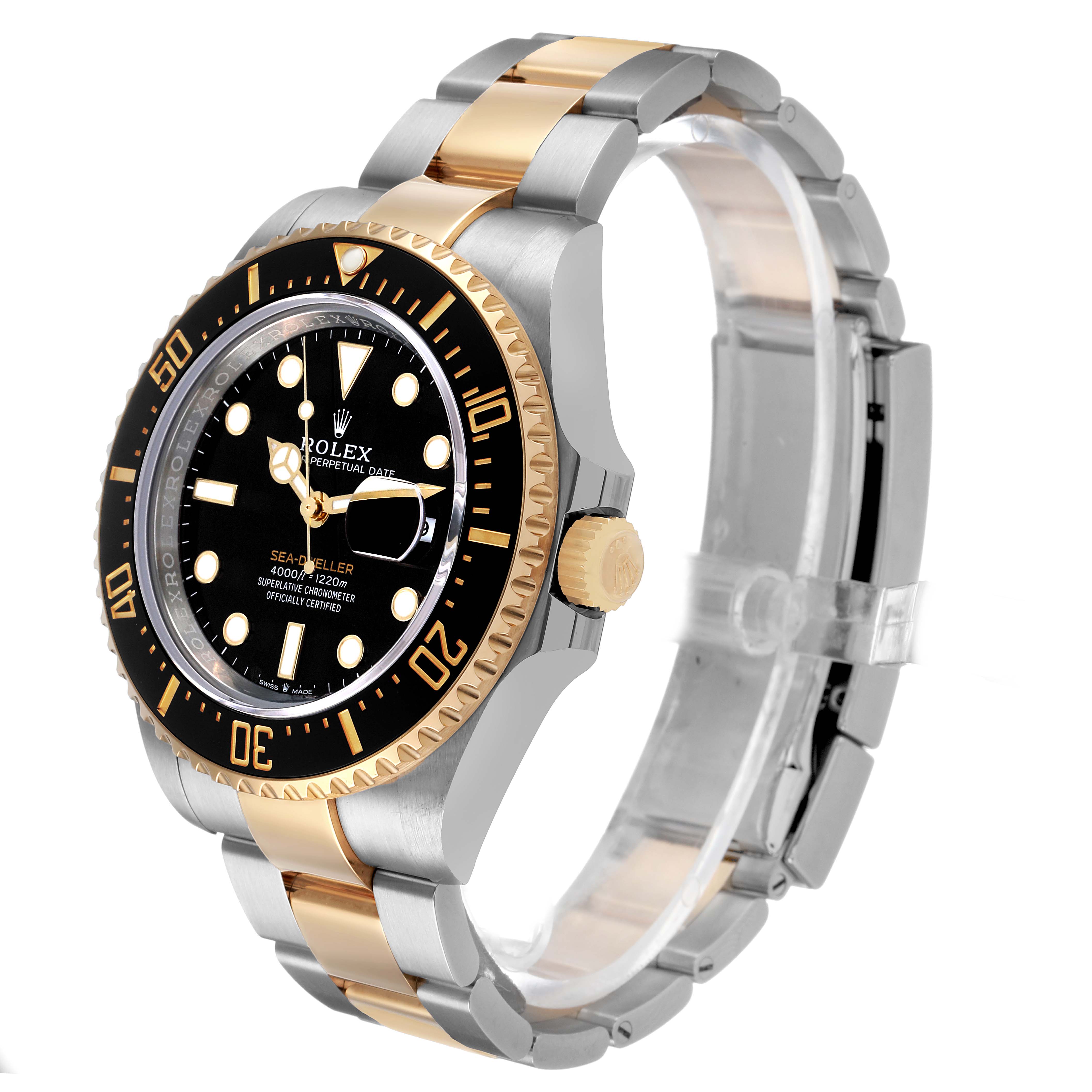 The Rolex Sea-Dweller 126603 Men's Stainless Steel Black Dial is shown at a tilted angle, highlighting the bezel, dial, crown, and two-tone bracelet.