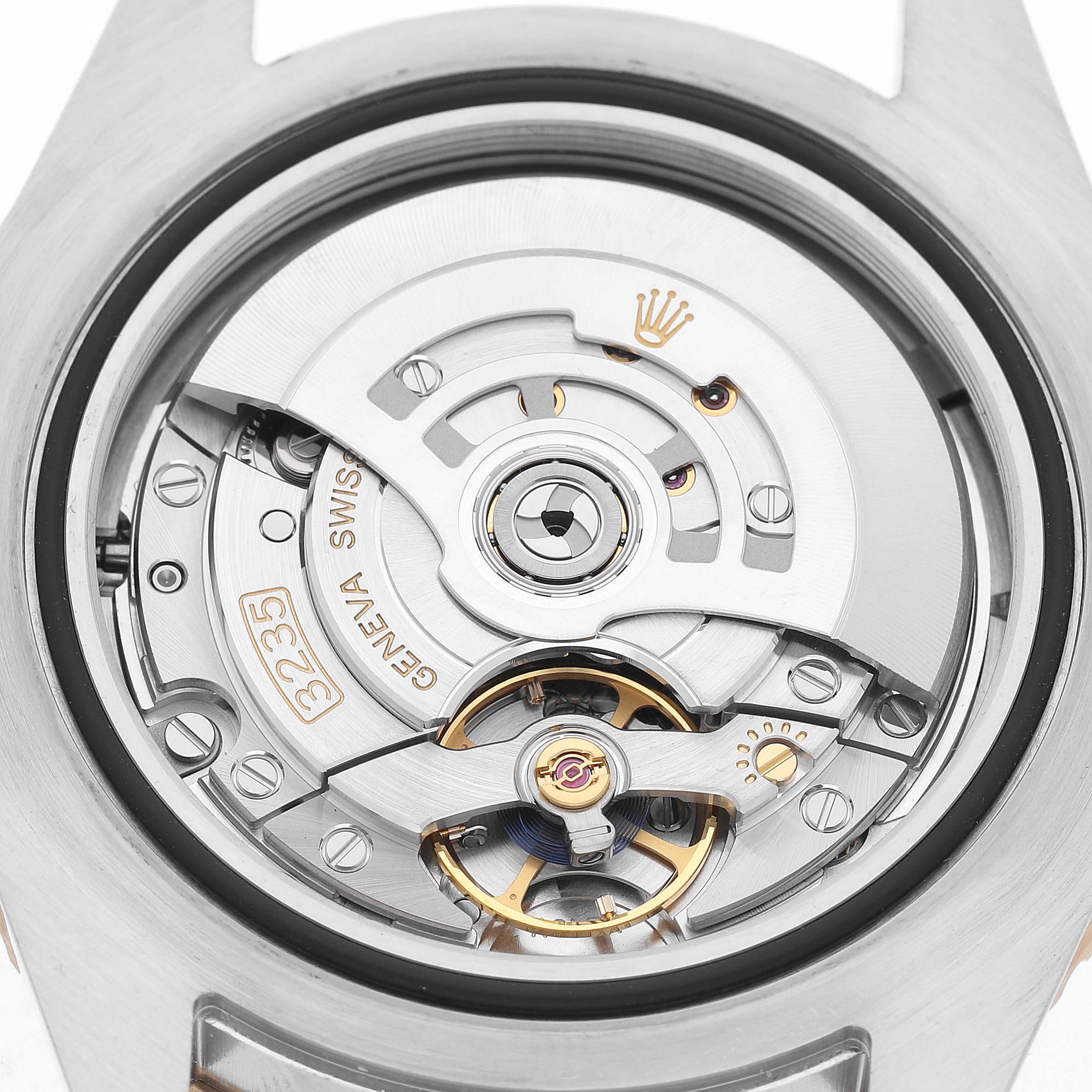 The image shows the movement of a Rolex Sea-Dweller 126603 Men's Stainless Steel Black Dial watch, focusing on the intricate details of the caliber 3235 mechanism.