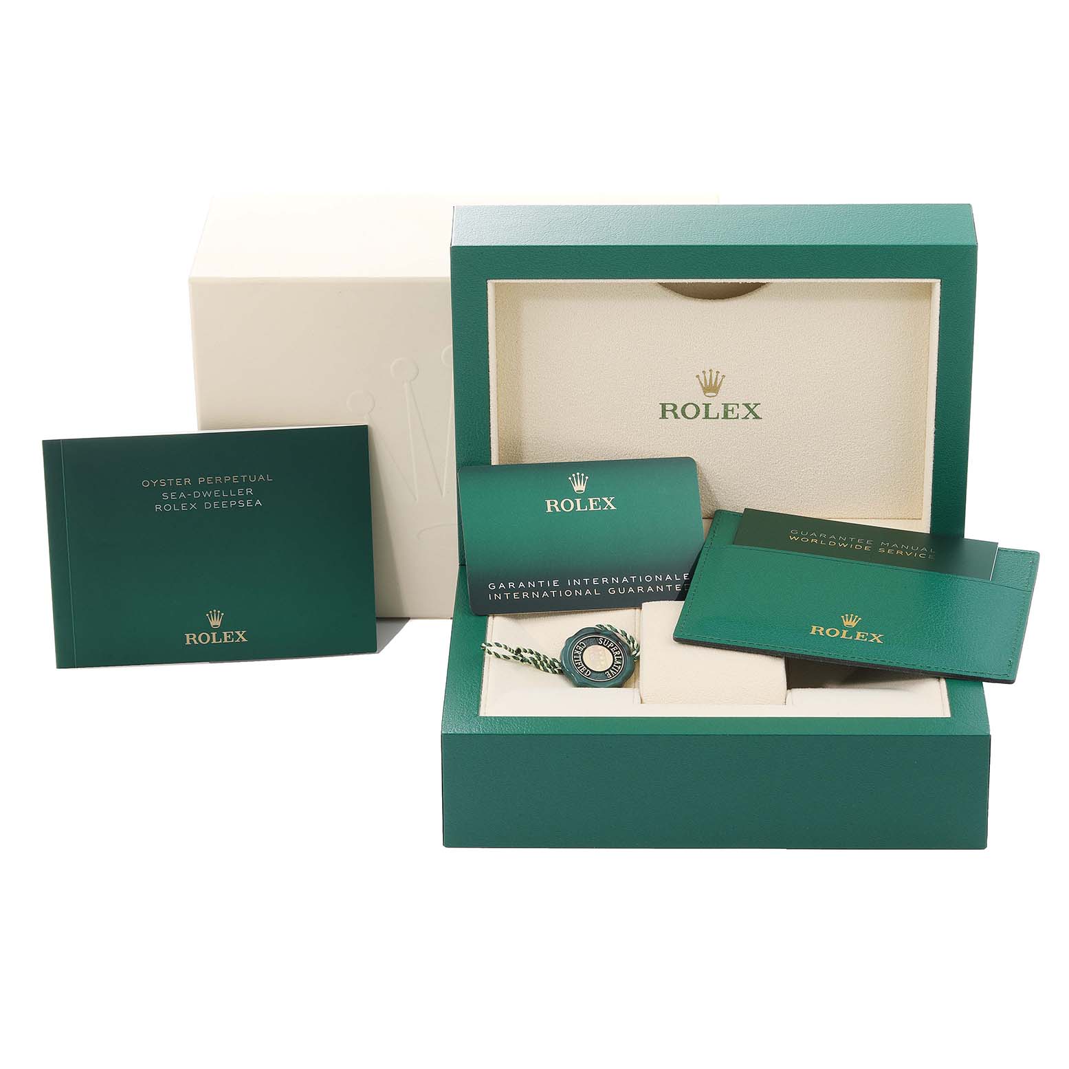 The image shows the packaging and documents for the Rolex Sea-Dweller 126603 Men
s Steel and Gold (two tone) Black Dial 126603 Men
s Steel and Gold (two tone) Black Dial, including the box, booklets, and warranty card.