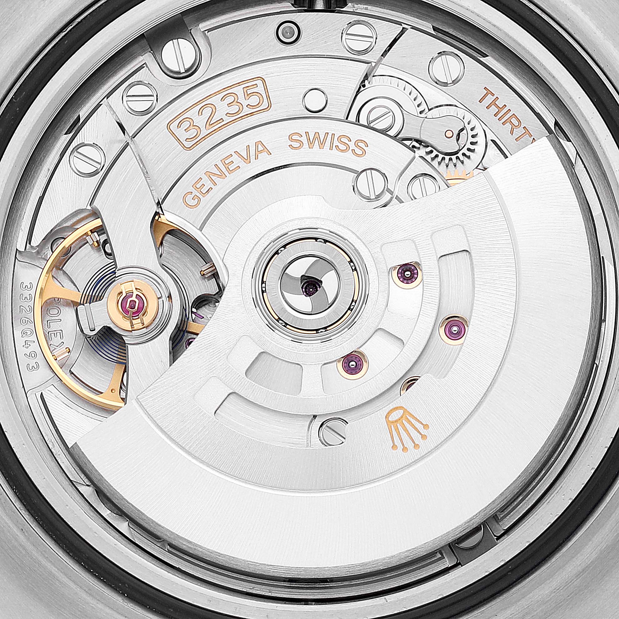 This image shows a close-up view of the movement mechanism of a Rolex Sea-Dweller 126603 Men
s Steel and Gold (two tone) Black Dial 126603 Men
s Steel and Gold (two tone) Black Dial watch, showcasing the intricate internal components.