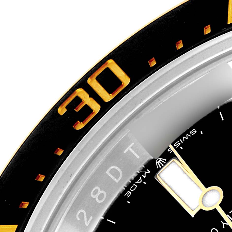 The image shows a close-up of the bezel and dial of a Rolex Sea-Dweller 126603 Men
s Steel and Gold (two tone) Black Dial 126603 Men
s Steel and Gold (two tone) Black Dial watch, highlighting the "30" minute marker.