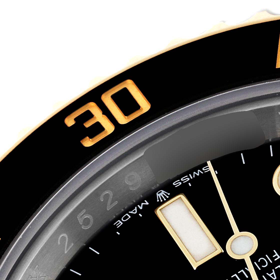 This close-up image of a Rolex Submariner 126613 Men's Steel and Gold (two tone) Black Dial 126613 Men's Steel and Gold (two tone) Black Dial watch showcases part of the bezel and the dial with the "30" marking visible.