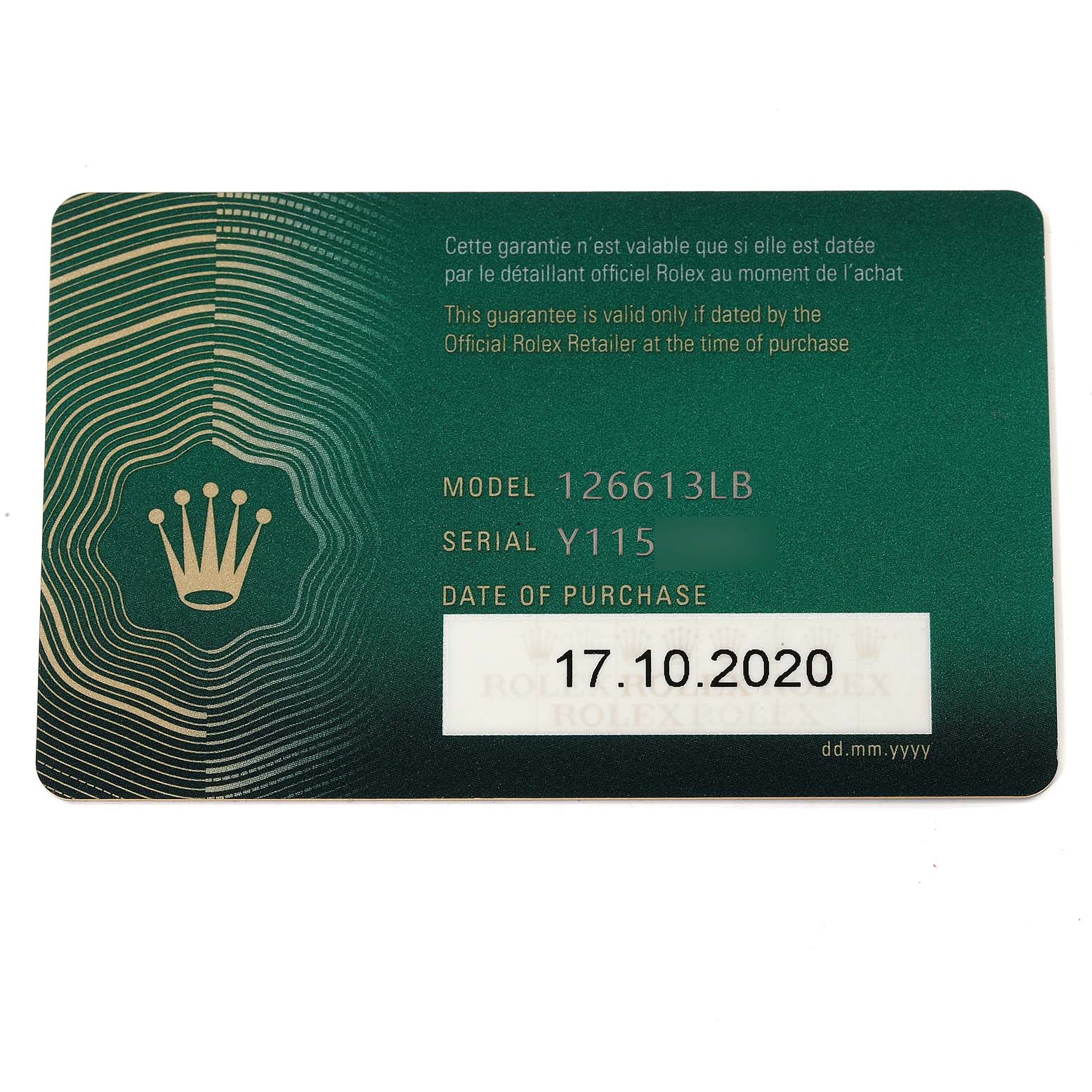 This image shows a warranty card for the Rolex Submariner 126613 Men's Steel and Gold (two tone) Blue Dial 126613 Men's Steel and Gold (two tone) Blue Dial model 126613LB.
