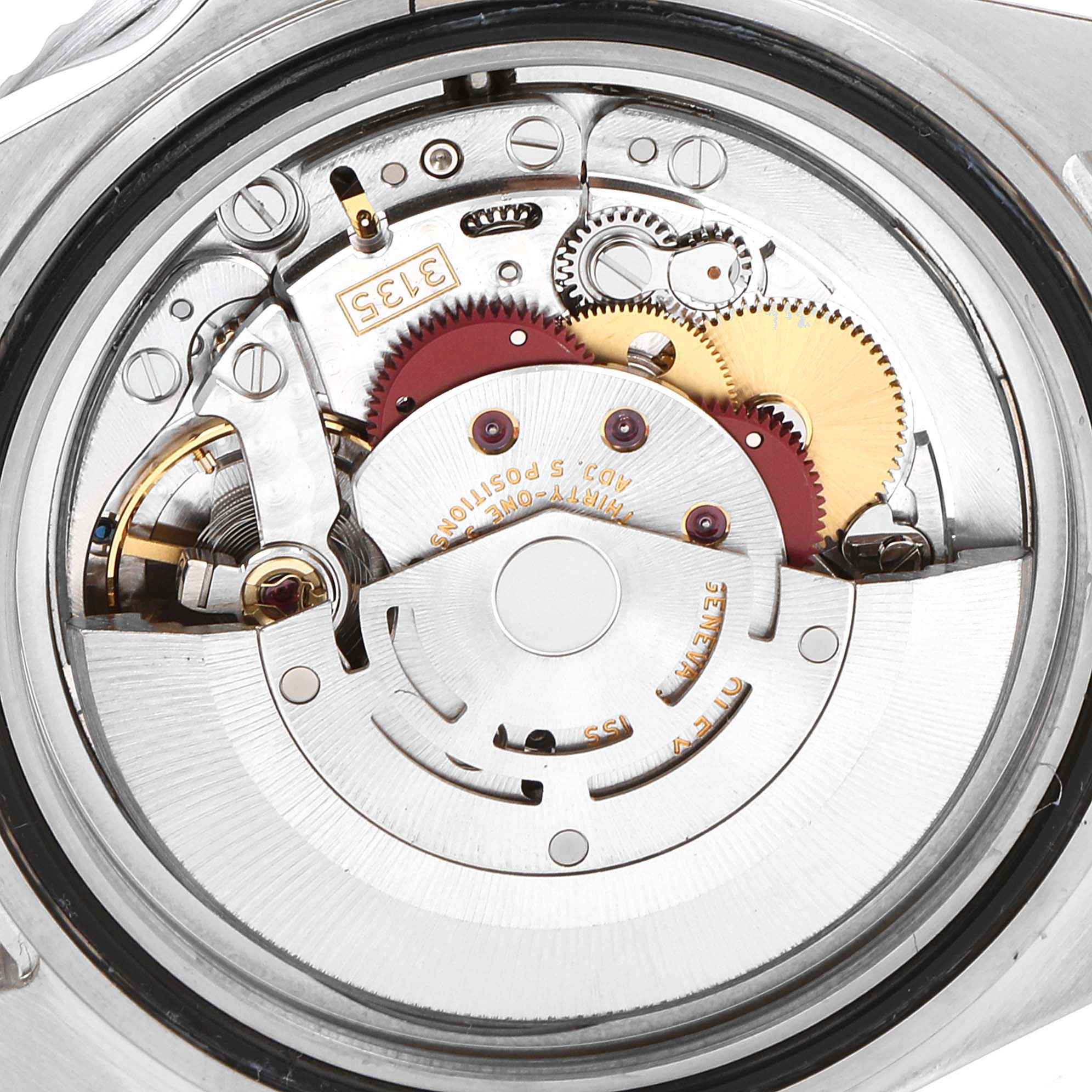 This image captures the internal mechanical movement of a Rolex Submariner 16610 Men's Stainless Steel Black Dial 16610 Men's Stainless Steel Black Dial watch.