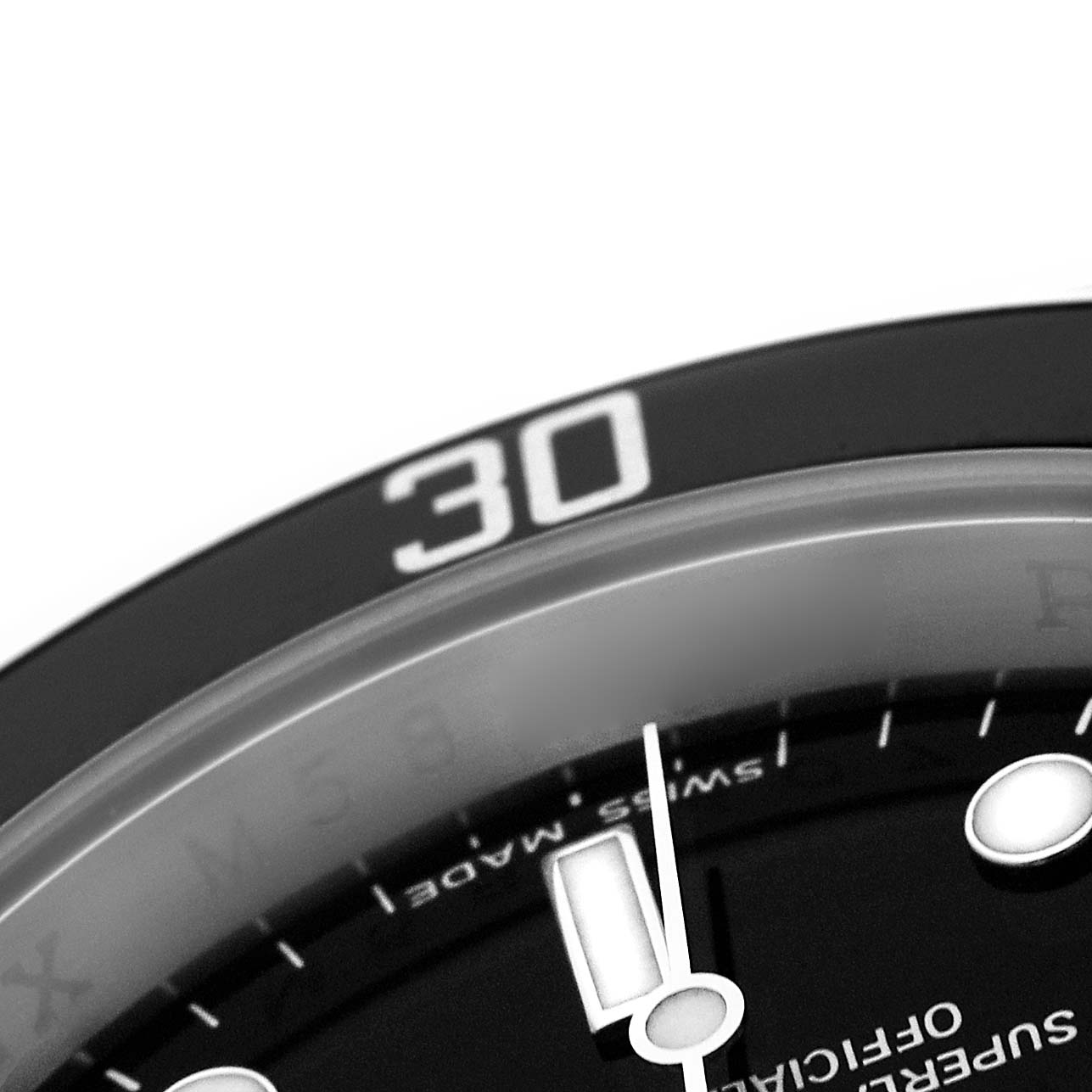 The image shows a close-up of the dial and bezel, highlighting the 30-minute marker on a Rolex Submariner 16610 Men's Stainless Steel Black Dial watch.