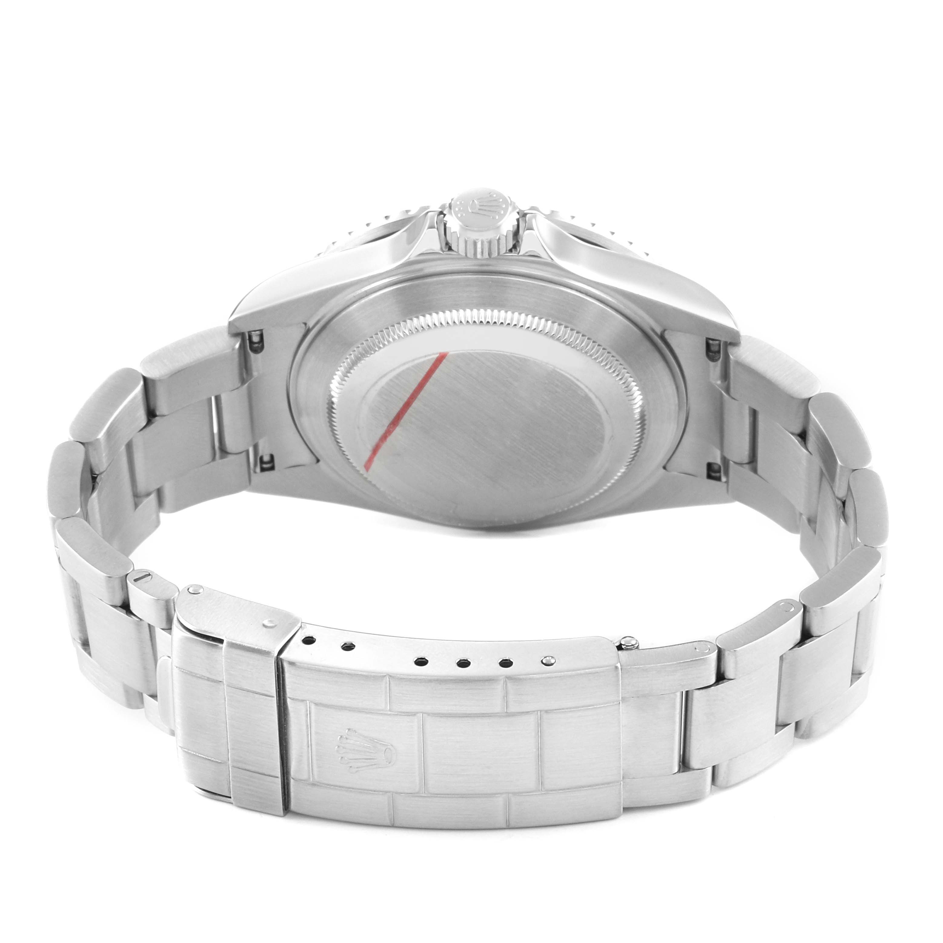 The image shows the back view of a Rolex Submariner 16610 Men's Stainless Steel Black Dial, highlighting the case back, crown, and bracelet clasp.