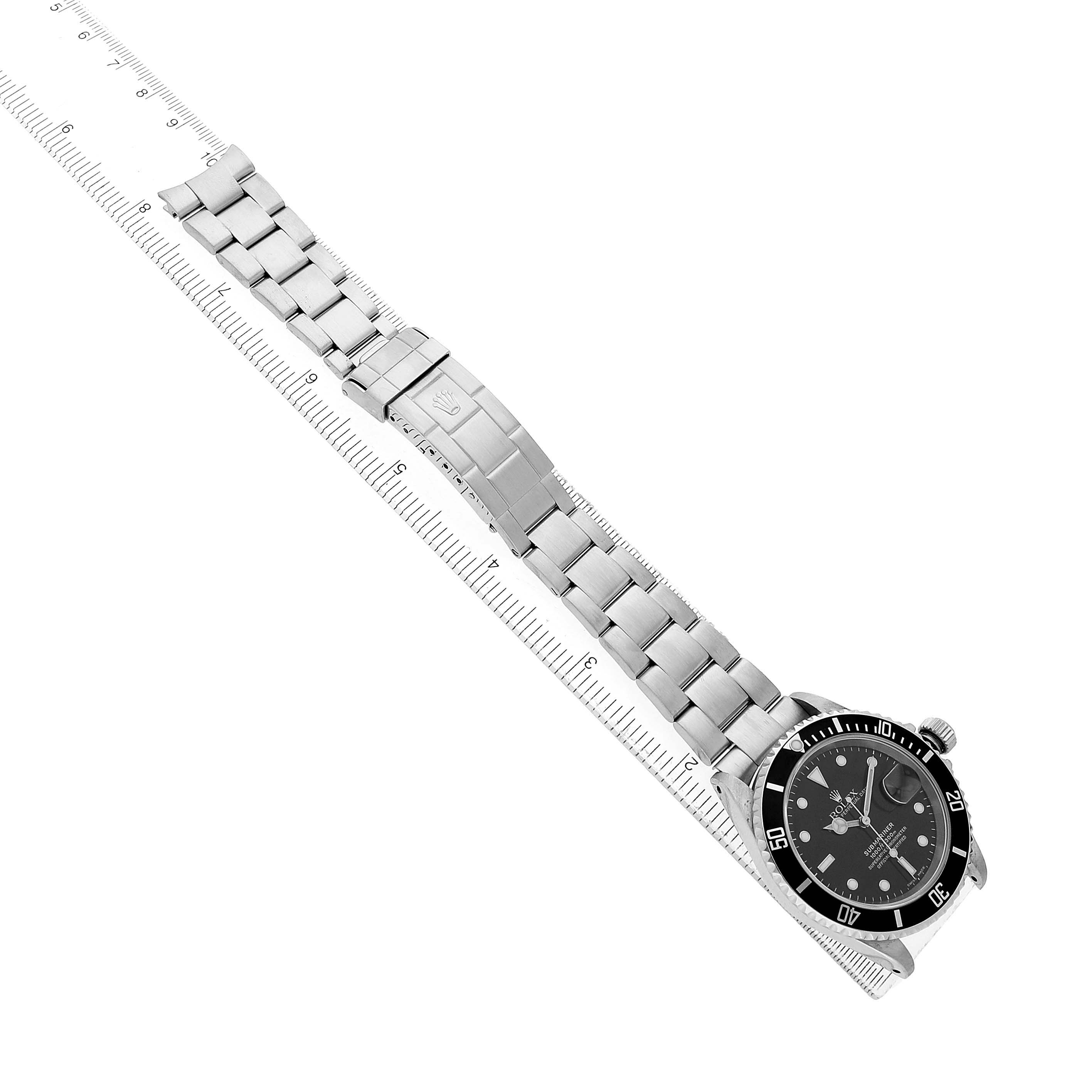 The image shows a Rolex Submariner 16610 Men's Stainless Steel Black Dial watch at a slight diagonal angle, displaying the bracelet, clasp, and face.