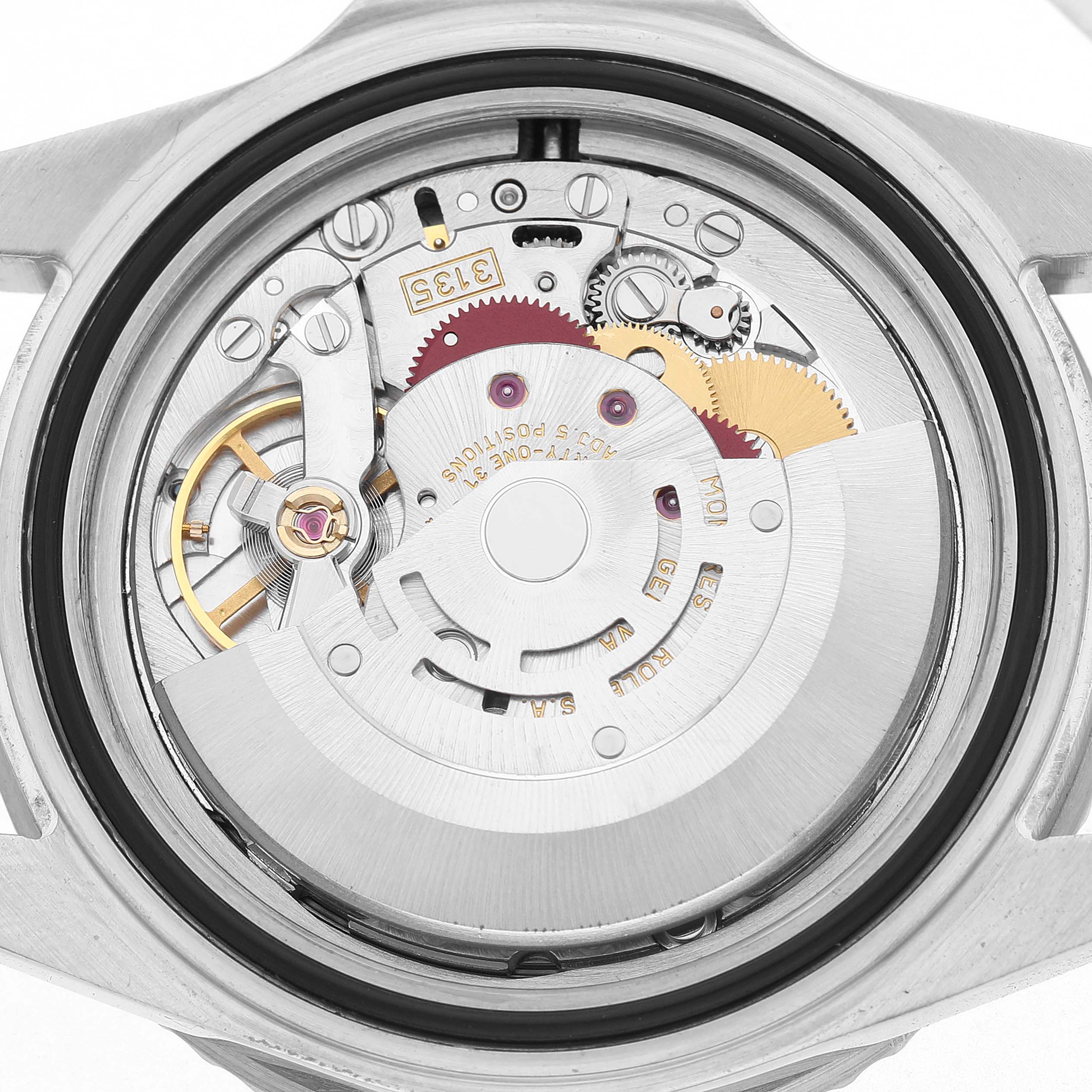 The image shows the movement mechanism of a Rolex Submariner 16610 Men's Stainless Steel Black Dial, viewed from the back, revealing gears and the rotor.