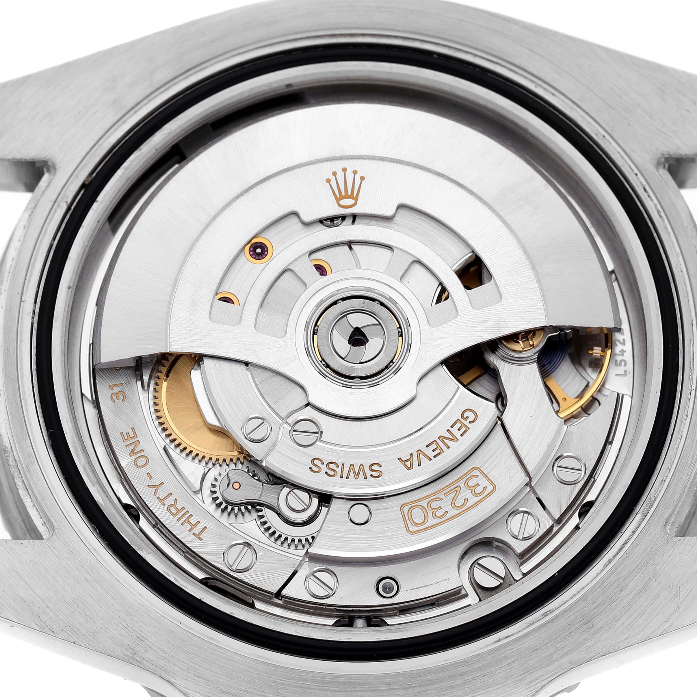 The Rolex Submariner 124060 Men's Stainless Steel Black Dial is shown from the back, highlighting its intricate movement and rotor.