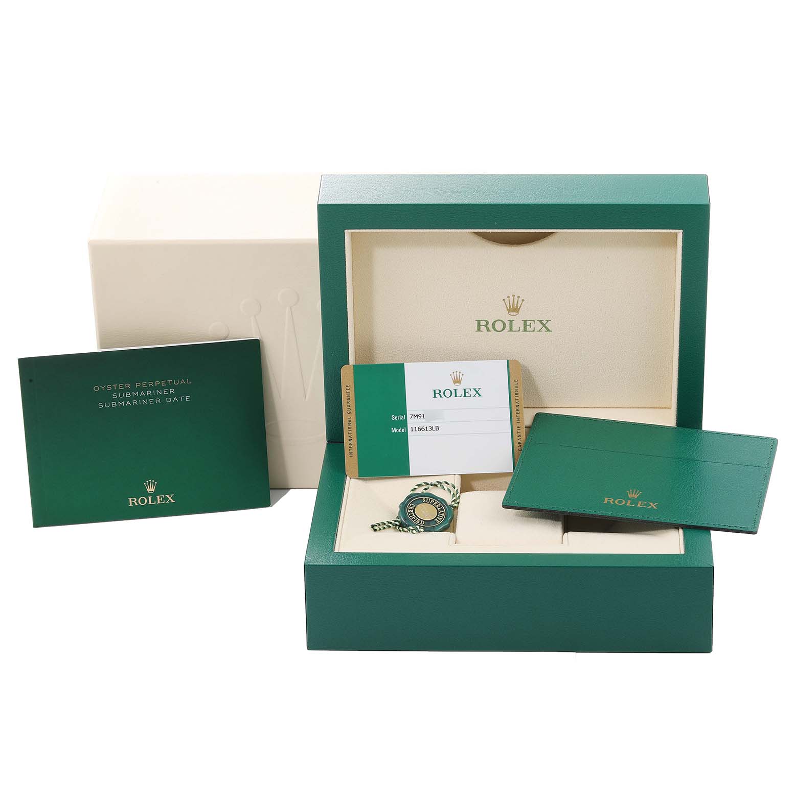 This image shows the packaging and accessories of a Rolex Submariner 116613 Men's Steel and Gold (two tone) Blue Dial 116613 Men's Steel and Gold (two tone) Blue Dial watch, including the box, manuals, and authenticity card.