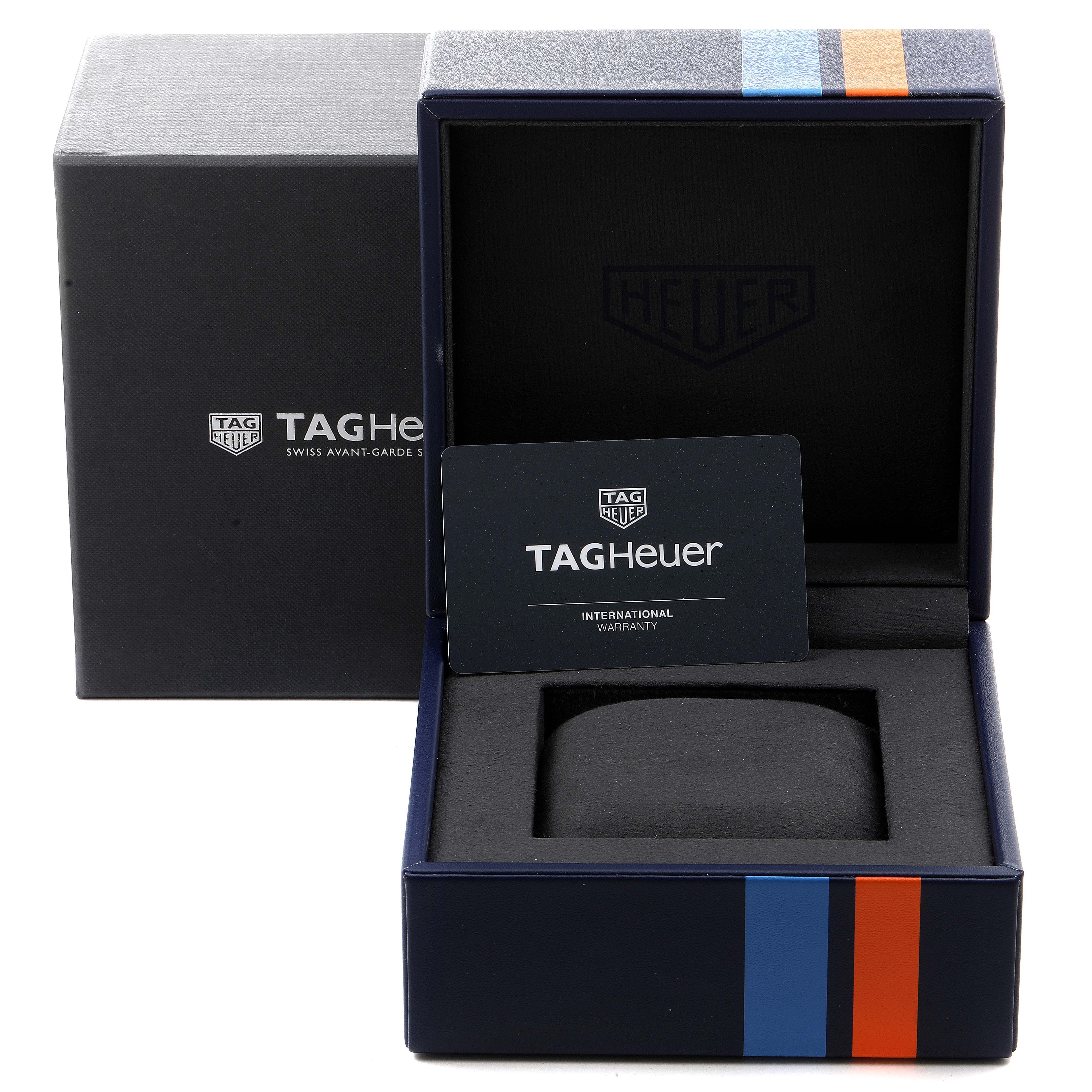 The image shows the open box and warranty card for the Tag Heuer Monaco CAW211R.FC6401 Men's Stainless Steel Blue Dial CAW211R.FC6401 Men's Stainless Steel Blue Dial watch package.