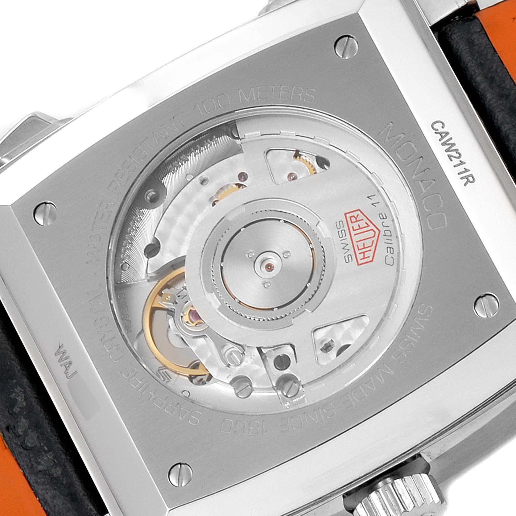 This image shows the back view of the Tag Heuer Monaco CAW211R.FC6401 Men's Stainless Steel Blue Dial CAW211R.FC6401 Men's Stainless Steel Blue Dial model watch, highlighting the movement and engravings.