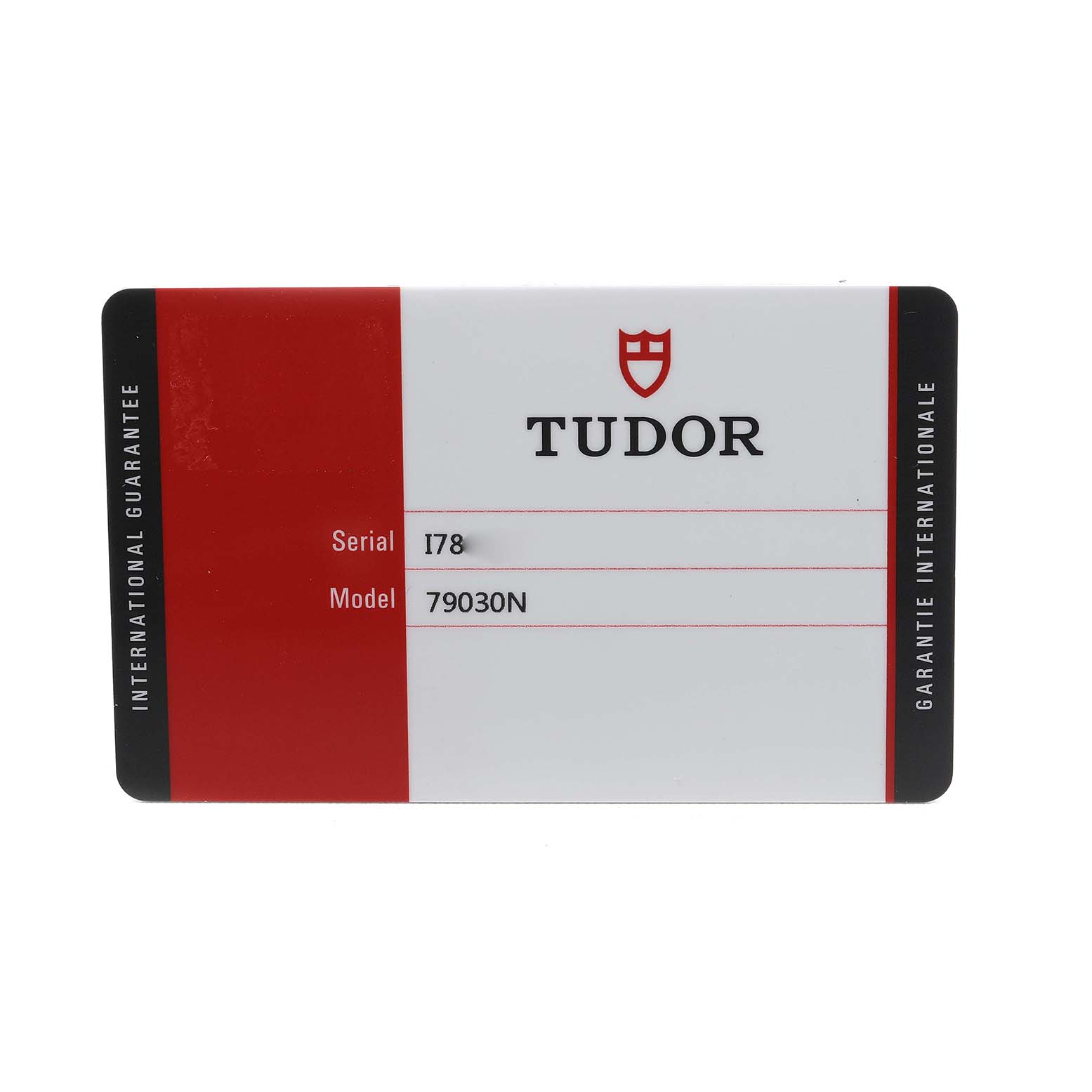 The image shows an international guarantee card for a Tudor Heritage Black Bay 79030 Men's Stainless Steel Black Dial, model 79030N.