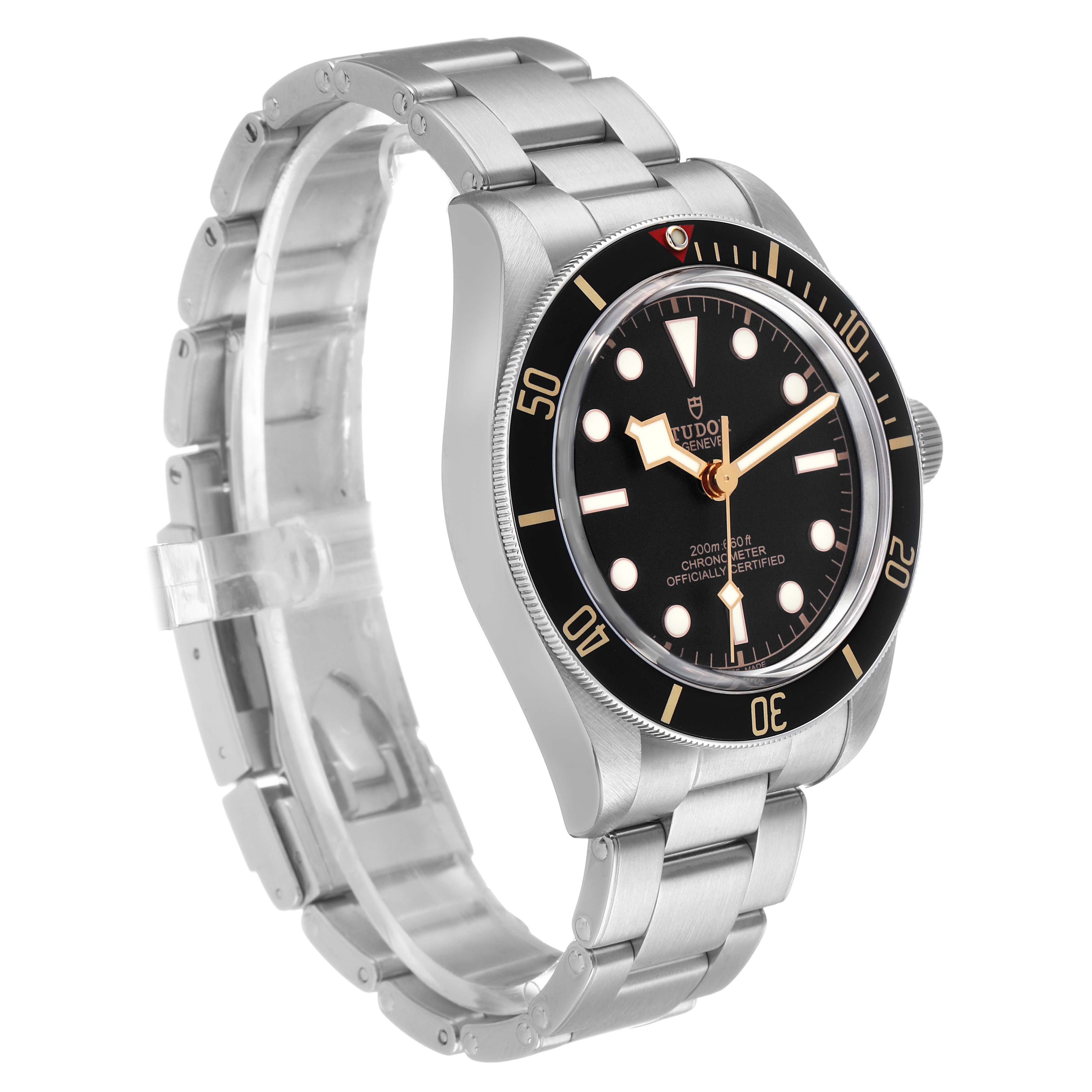 The Tudor Heritage Black Bay 79030 Men's Stainless Steel Black Dial watch is shown at a three-quarter angle, displaying the face, bezel, case, and bracelet.