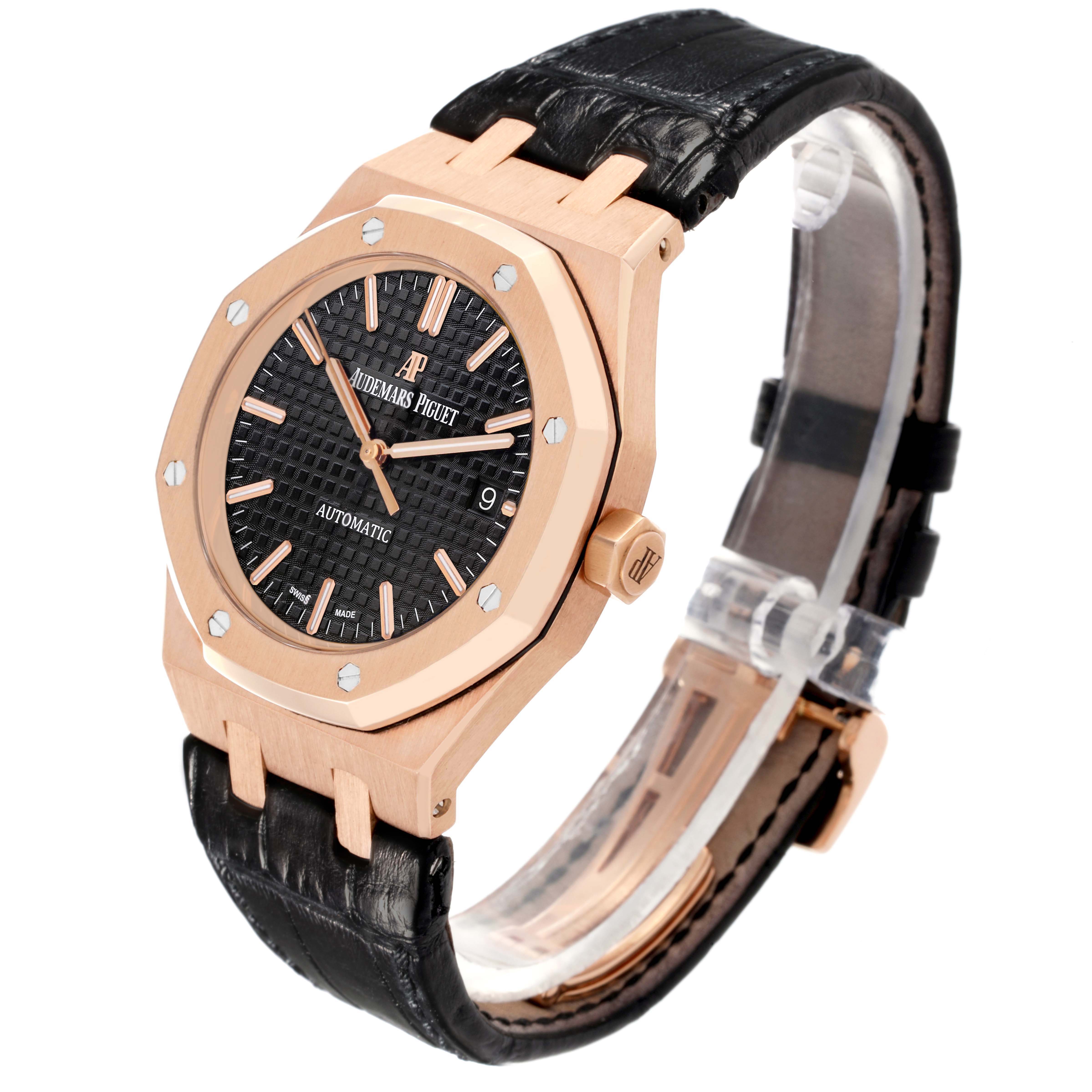 The Audemars Piguet Royal Oak 15450OR.OO.D002CR.01 Men's Rose Gold Black Dial watch is shown at an angled side view, highlighting its octagonal bezel, dial, crown, and leather strap.