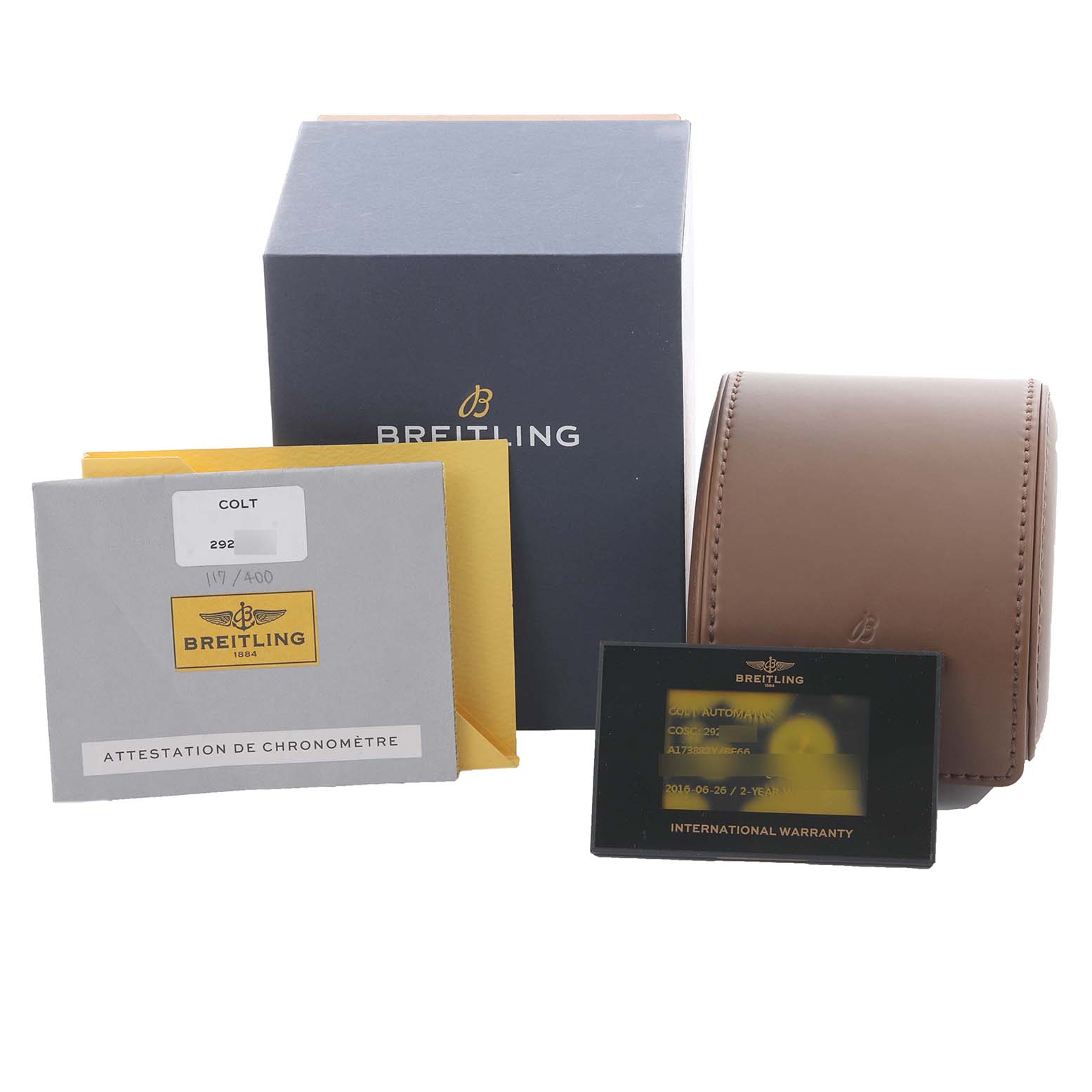 The image shows the packaging and accessories for a Breitling Colt A173882Y/BE66 Men's Stainless Steel Black Dial A173882Y/BE66 Men's Stainless Steel Black Dial watch, including the box, pouch, warranty card, and documentation.