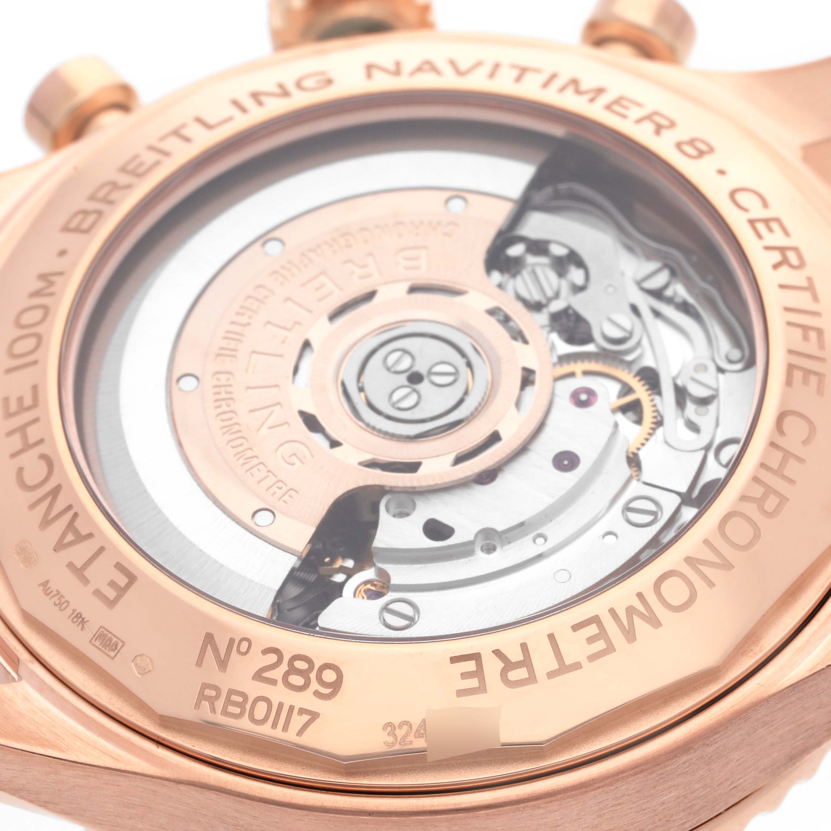 The image shows the rear view of a Breitling Aviator RB0117131Q1P1 Men's Rose Gold Brown Dial RB0117131Q1P1 Men's Rose Gold Brown Dial watch, revealing its mechanical movement and engraved details.