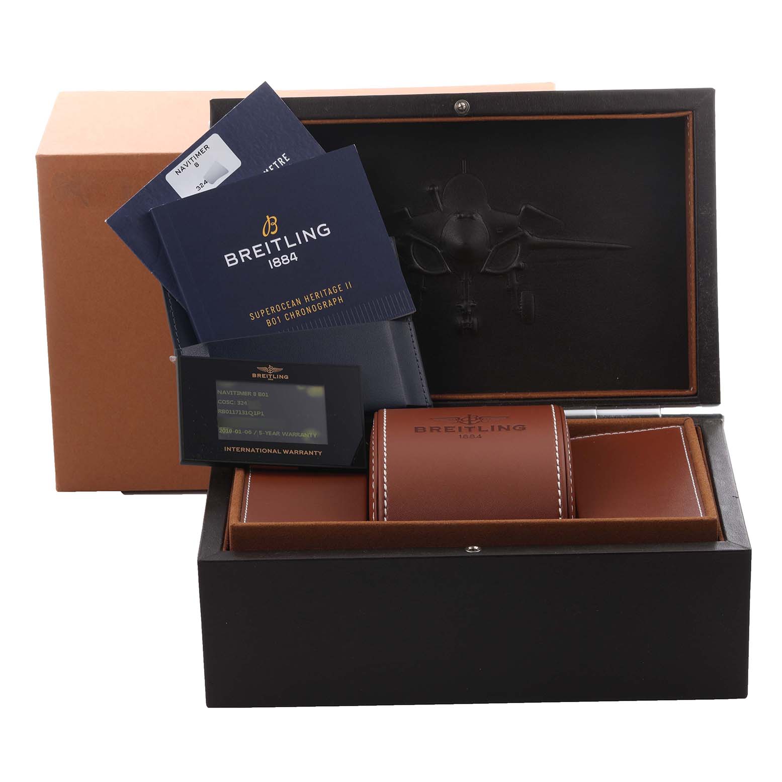 The image shows the Breitling Aviator RB0117131Q1P1 Men's Rose Gold Brown Dial RB0117131Q1P1 Men's Rose Gold Brown Dial watch's packaging, warranty booklet, and leather case from a top-front angle.