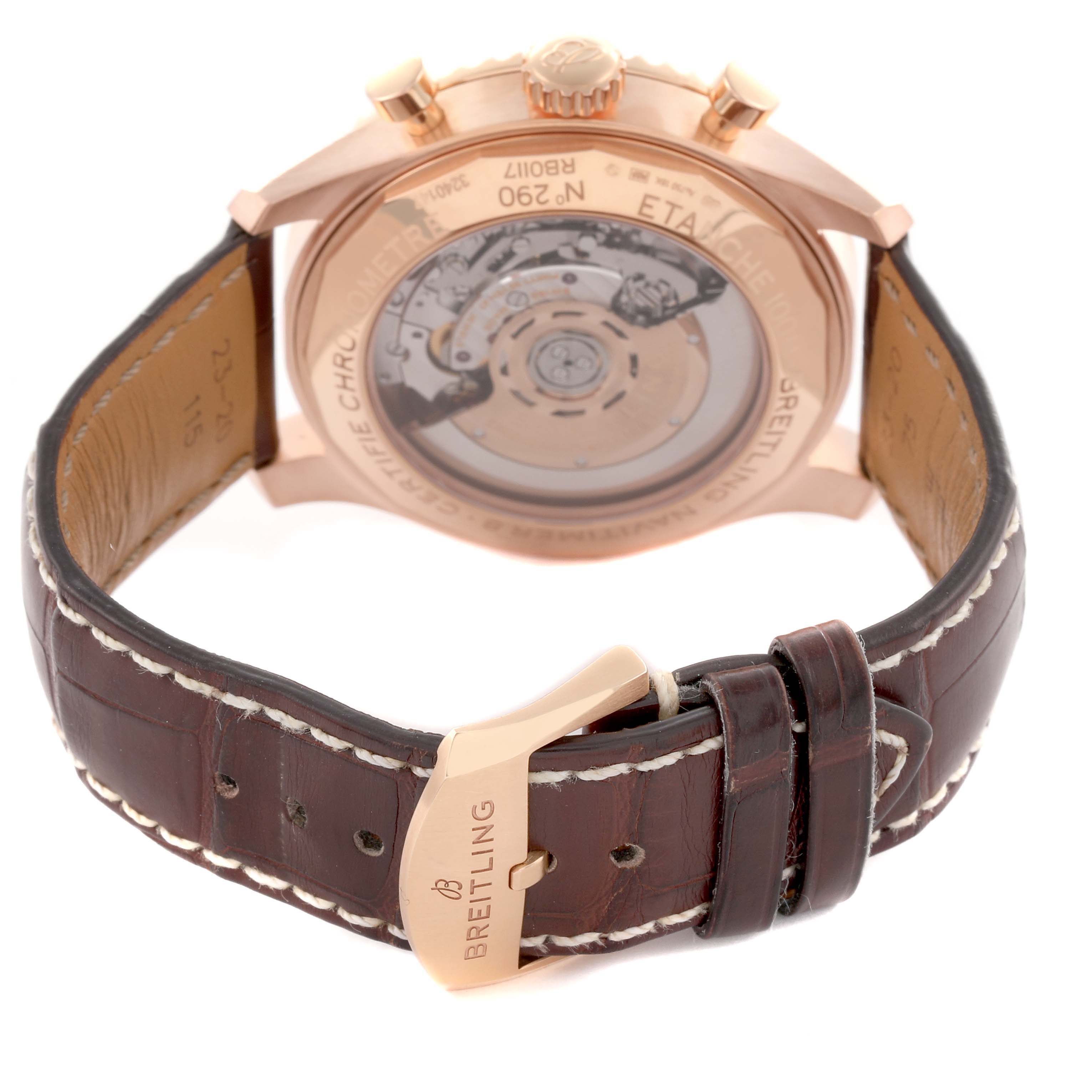 The image shows the rear view of a Breitling Aviator RB0117131Q1P1 Men
s Rose Gold Brown Dial RB0117131Q1P1 Men
s Rose Gold Brown Dial watch, highlighting the transparent case back and leather strap with buckle.