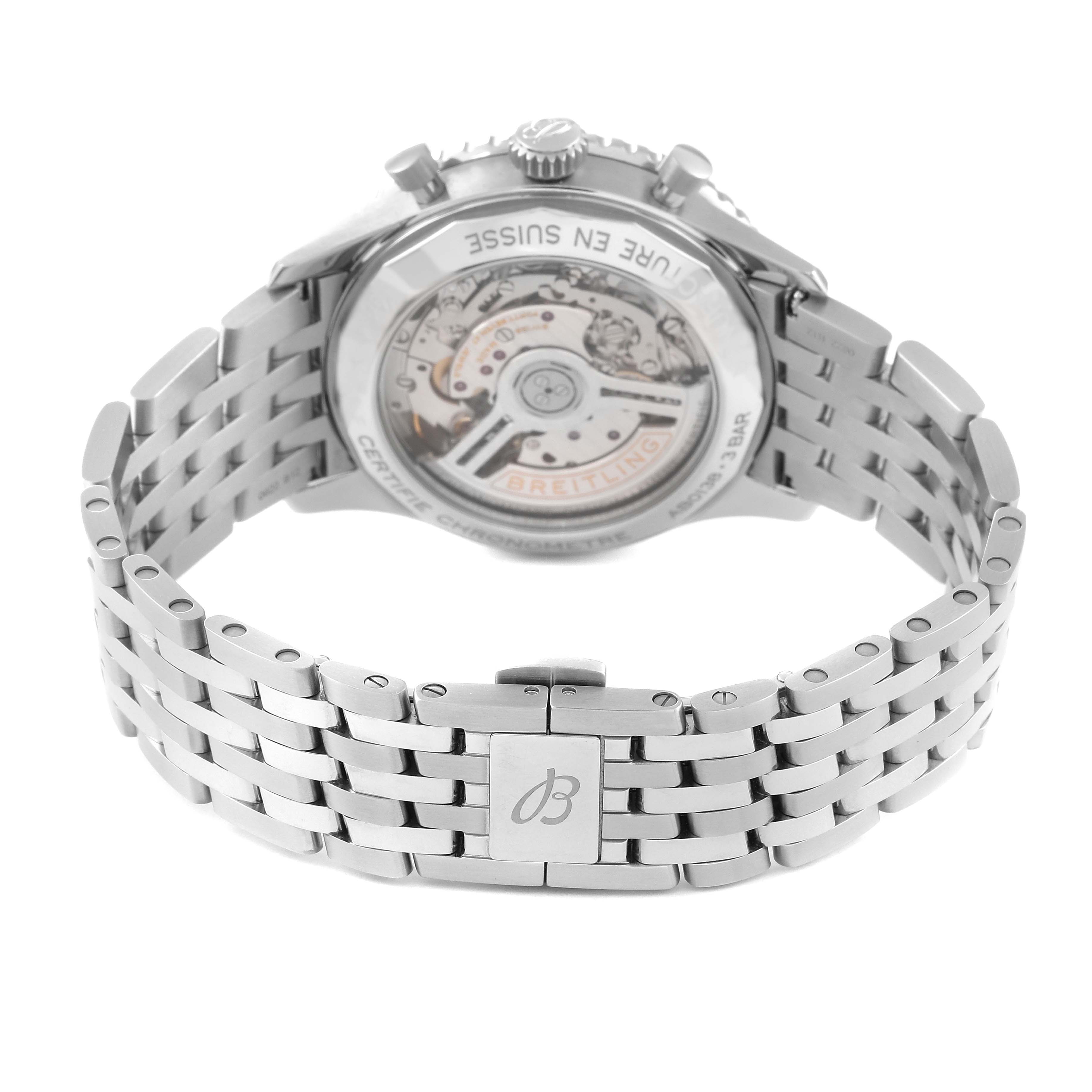 The image shows the back view of a Breitling Navitimer AB0138 Men
s Stainless Steel Blue Dial AB0138 Men
s Stainless Steel Blue Dial watch with its open case back and stainless steel bracelet.