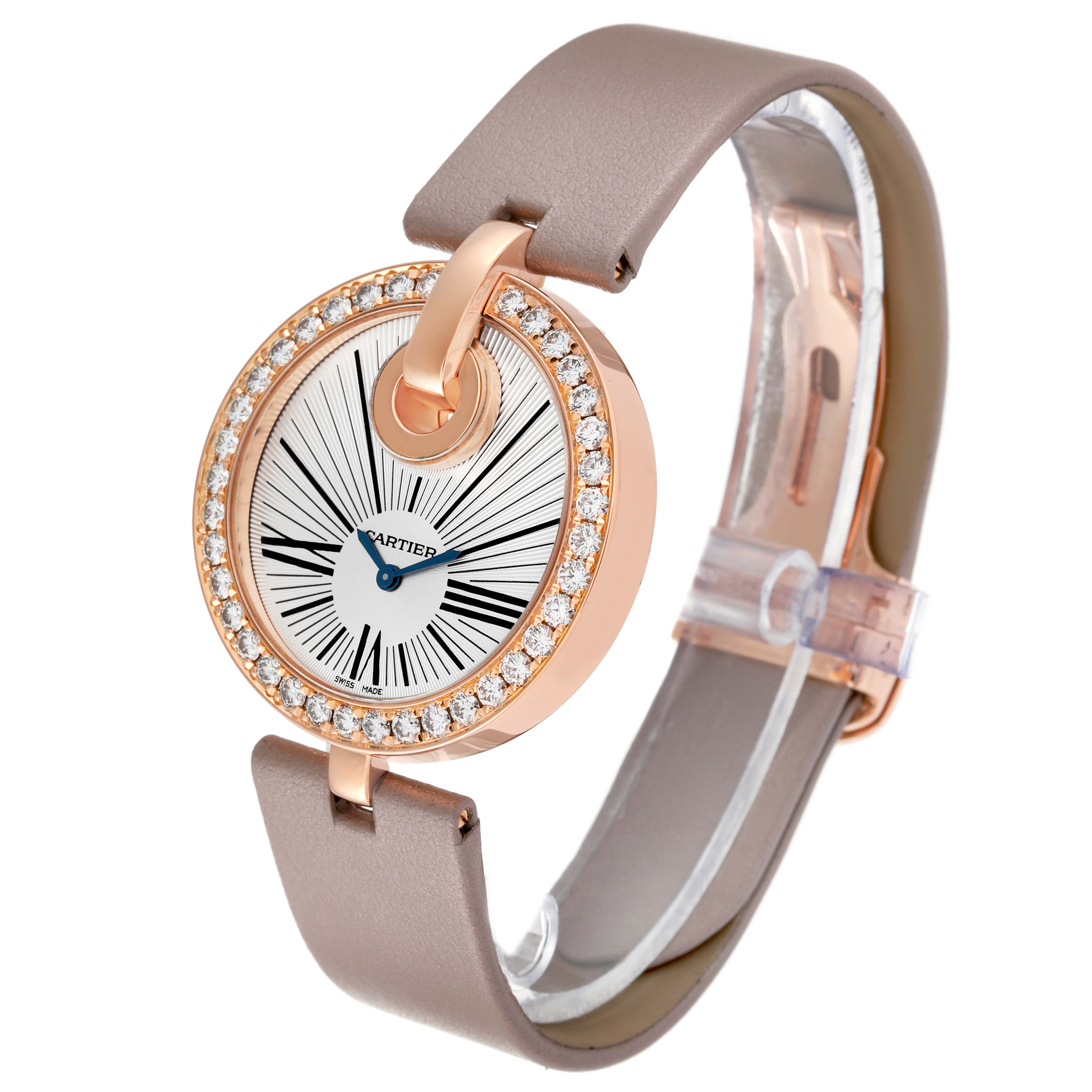 The Cartier Ballon Bleu WG600011 Women's Rose Gold Silver Dial WG600011 Women's Rose Gold Silver Dial watch is shown at an angled side view, displaying the face, bezel, and leather strap.