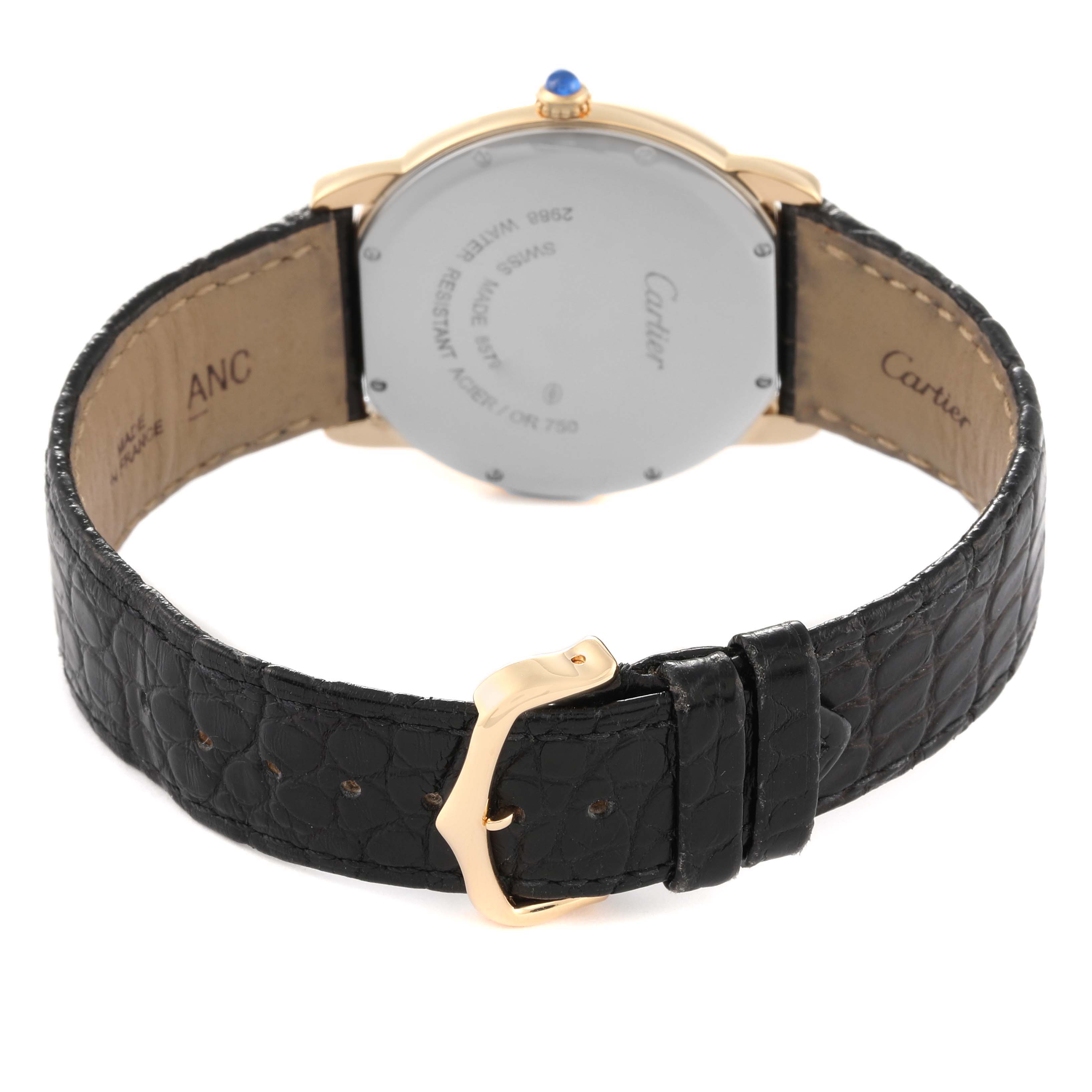 The image shows the back and side profile of a Cartier Ronde W6700455 Men
s Steel and Gold (two tone) Silver Dial W6700455 Men
s Steel and Gold (two tone) Silver Dial model watch, highlighting its black leather strap and buckle.