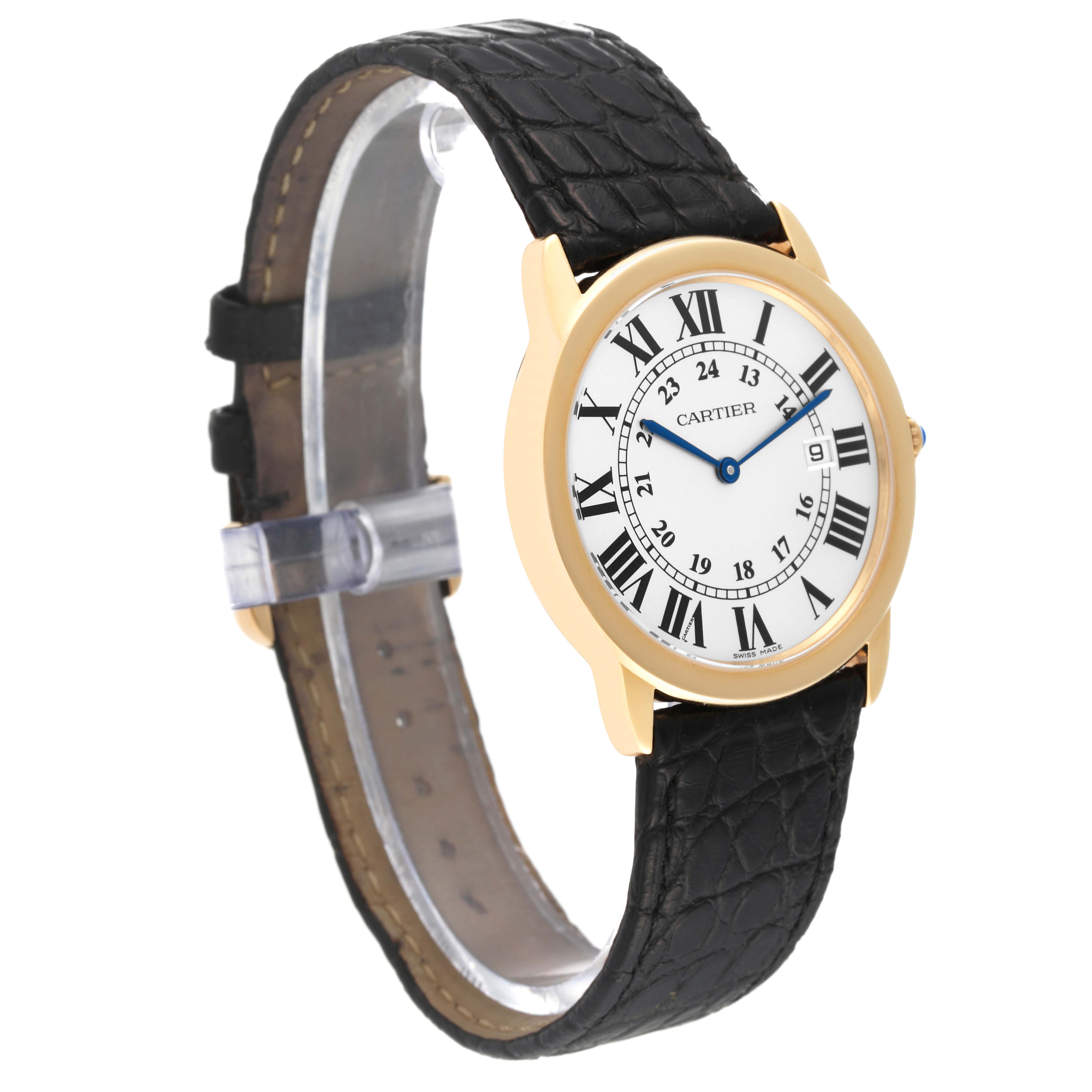 The Cartier Ronde W6700455 Men
s Steel and Gold (two tone) Silver Dial W6700455 Men
s Steel and Gold (two tone) Silver Dial watch is shown at a three-quarter angle, displaying its face, bezel, and black leather strap.