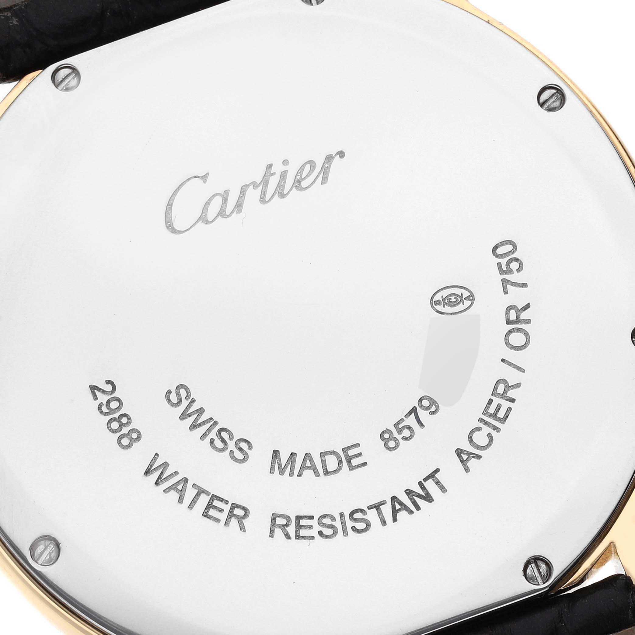 The image shows the back case of the Cartier Ronde W6700455 Men
s Steel and Gold (two tone) Silver Dial W6700455 Men
s Steel and Gold (two tone) Silver Dial model watch, displaying branding and specifications.