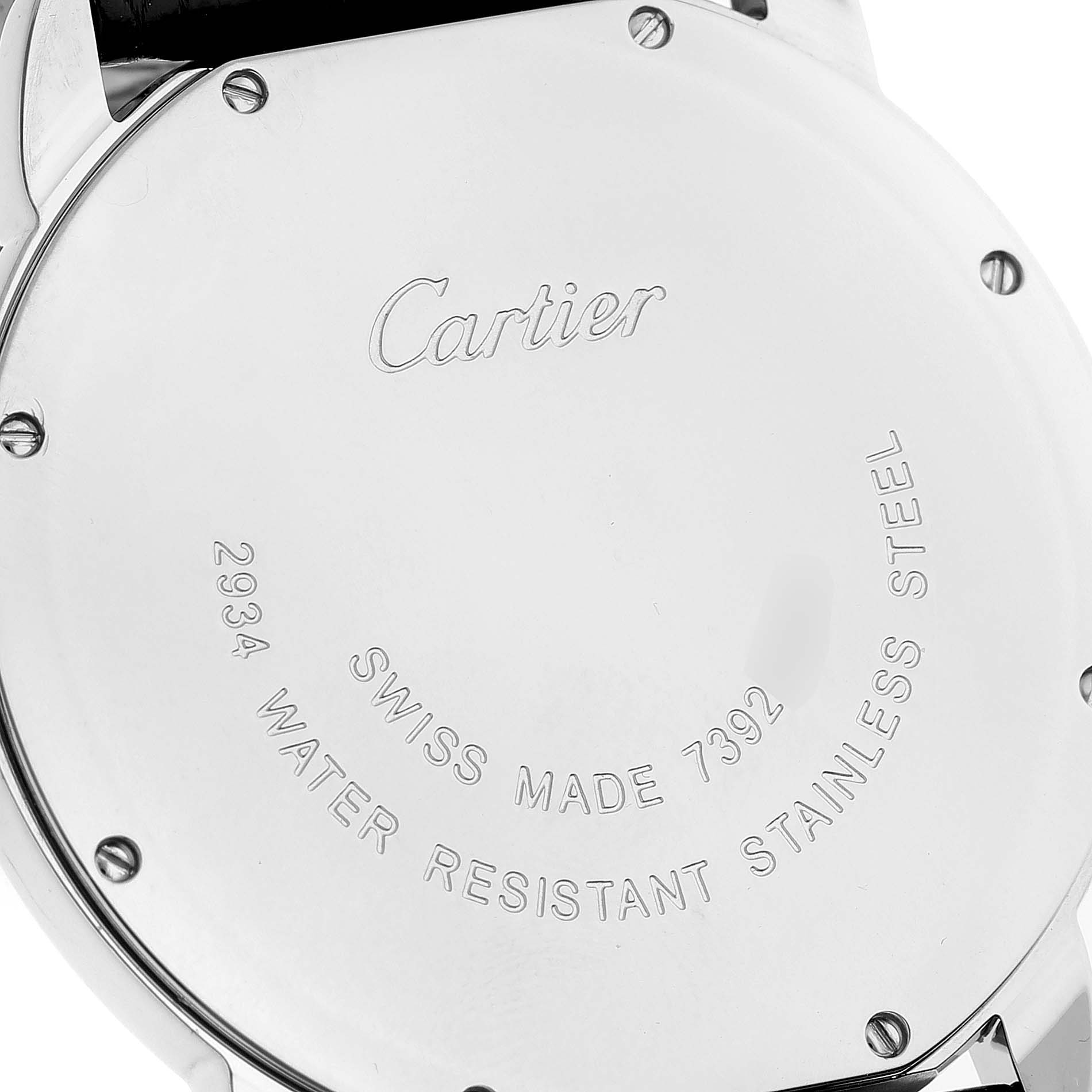 The image shows the back case of a Cartier Ronde W6700255 Men's Stainless Steel Silver Dial watch, highlighting engravings and screws.