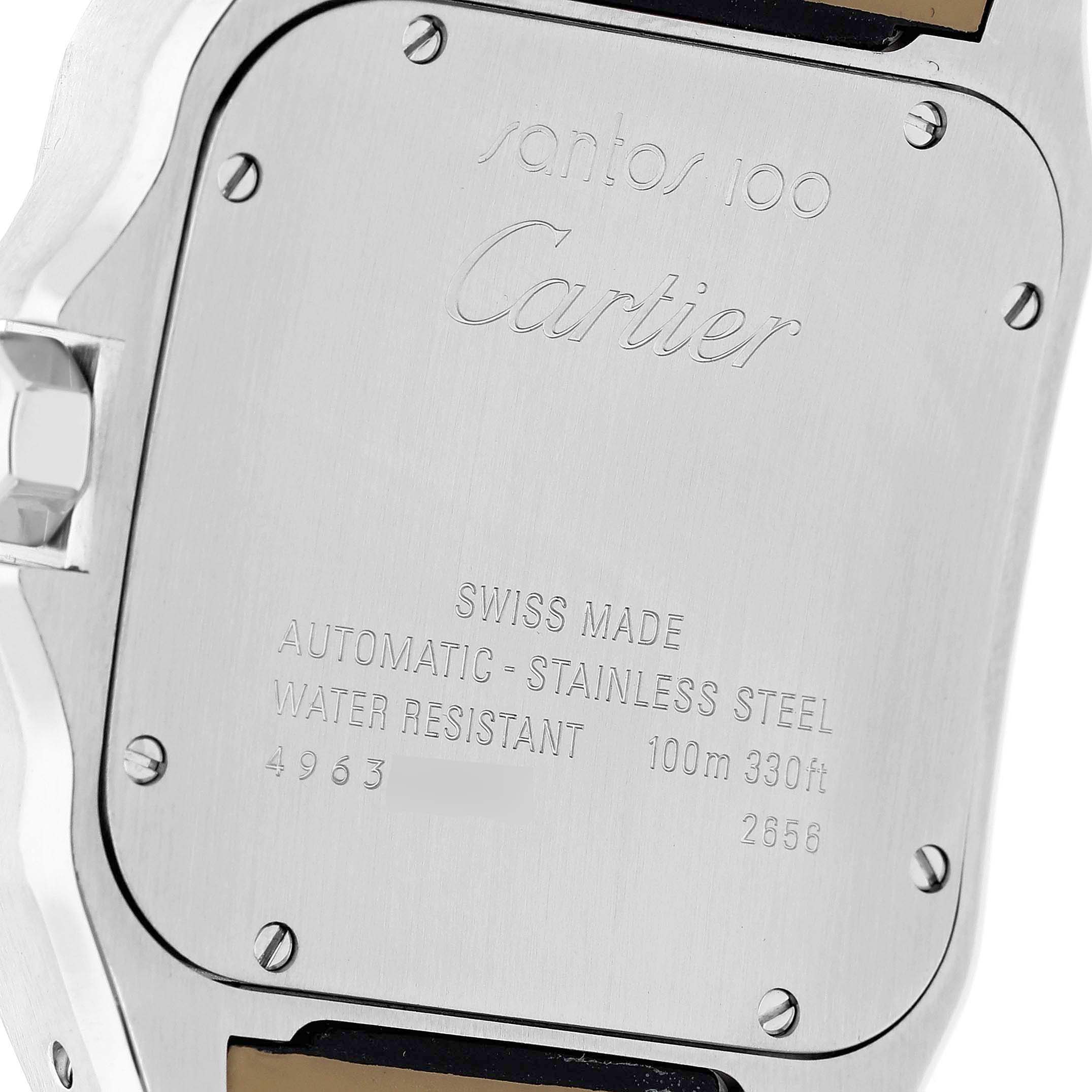 The image shows the back of a Cartier Santos W20073X8 Men's Stainless Steel Silver Dial watch, highlighting its engraved details and screws.