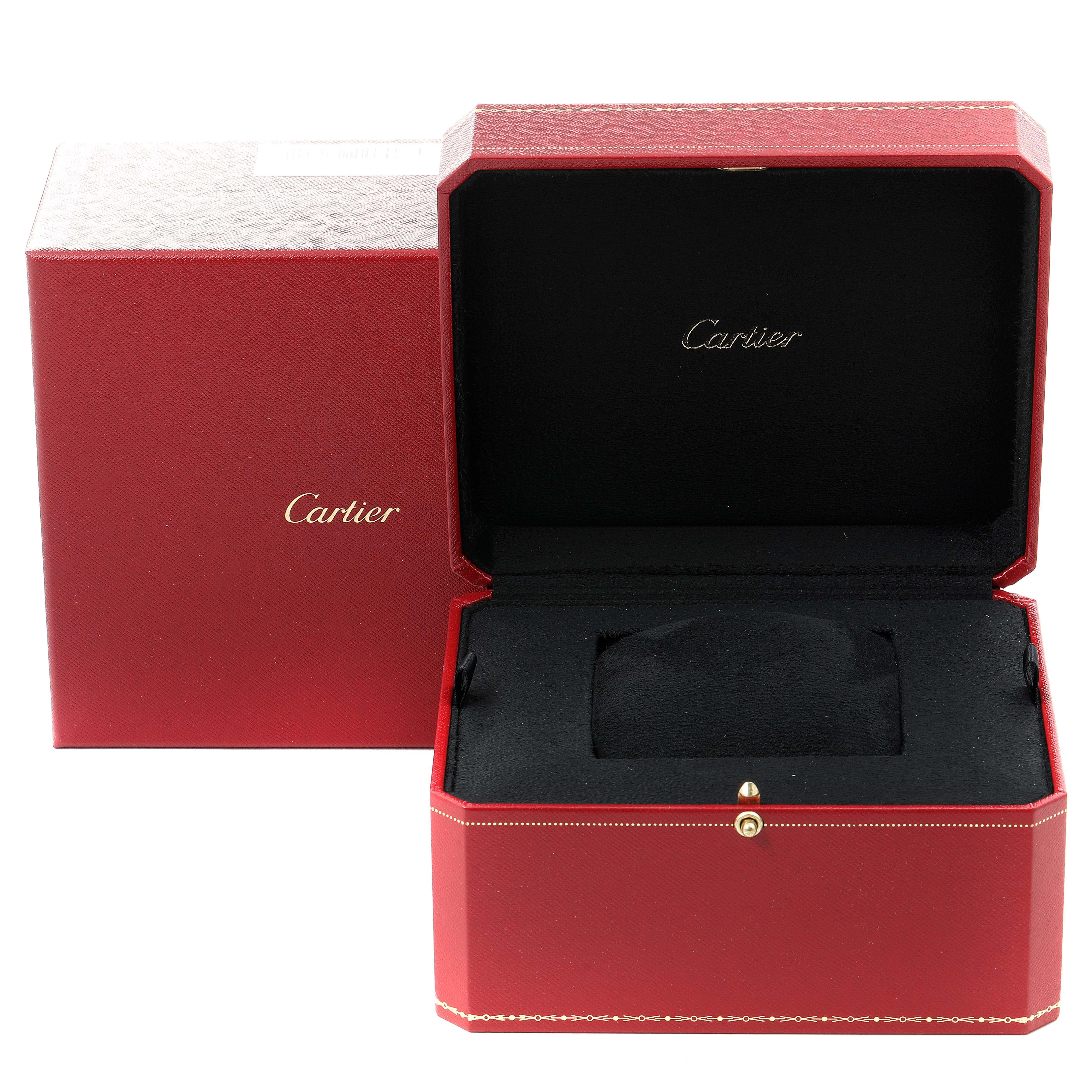 The image shows an open red Cartier box for the Tank Francaise model watch, featuring the brand name inside the box.