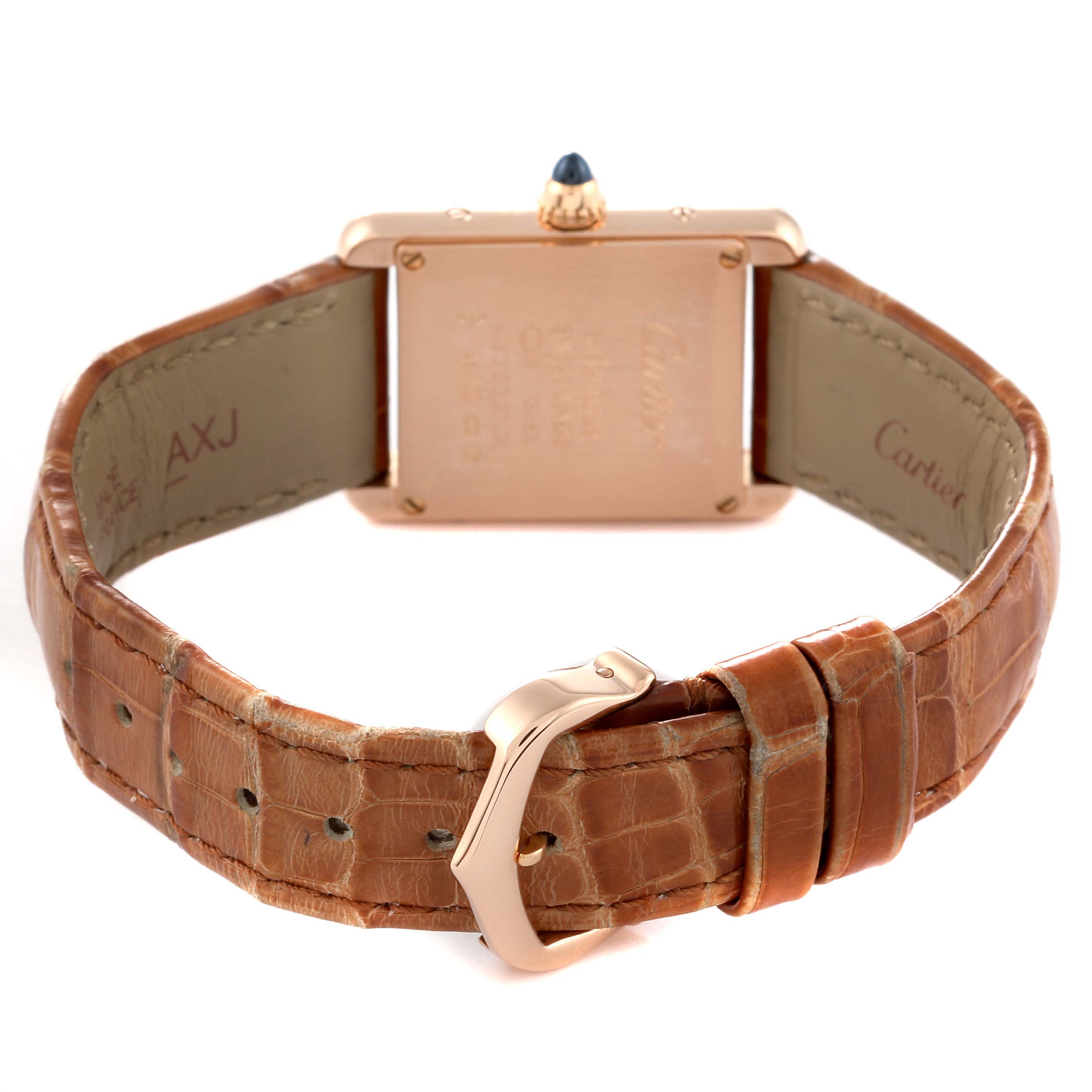 This image shows the back view of a Cartier Tank Louis WGTA0010 Women's Rose Gold Silver Dial WGTA0010 Women's Rose Gold Silver Dial watch, highlighting its case back, crown, and leather strap with a buckle.