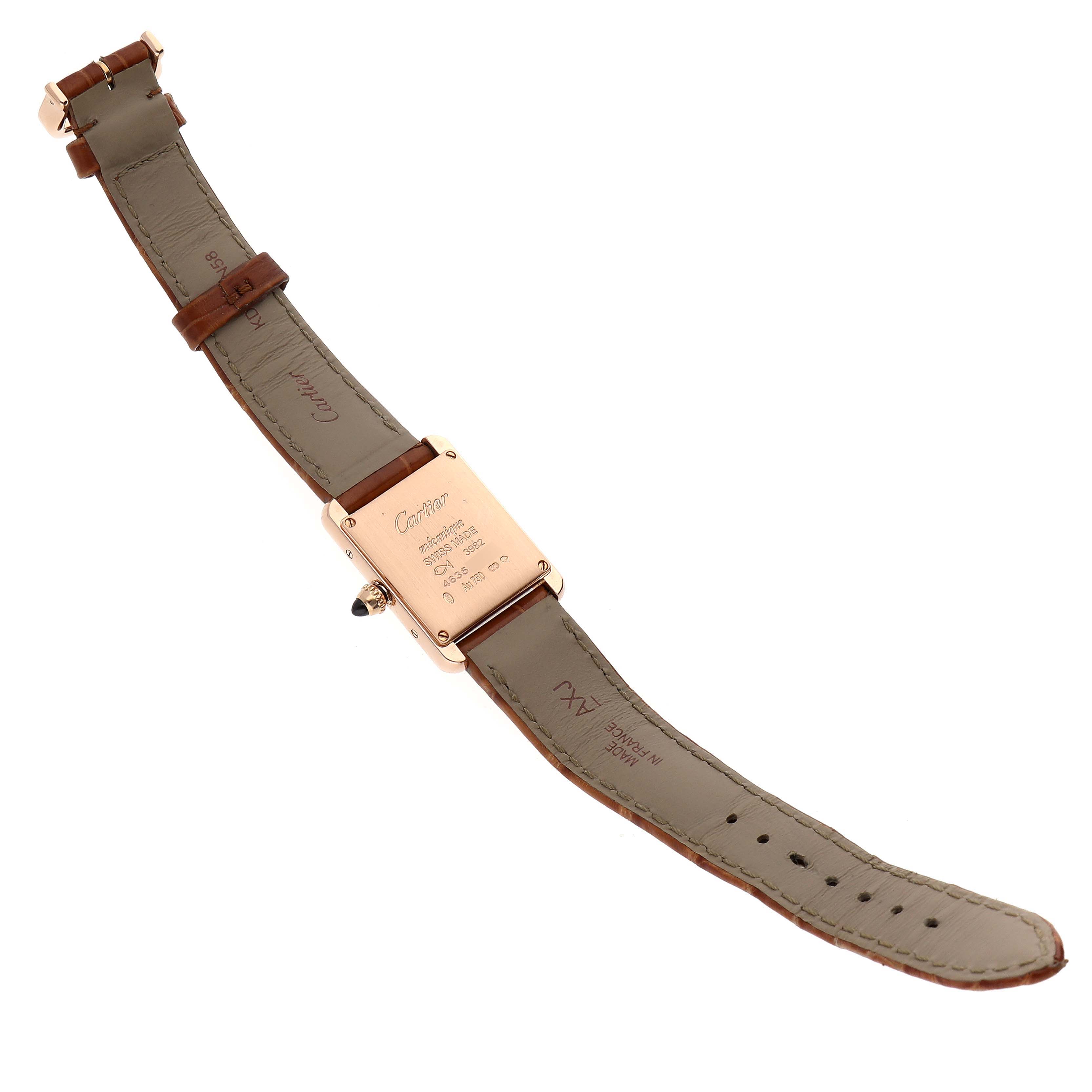 This image shows the backside and leather straps of a Cartier Tank Louis WGTA0010 Women's Rose Gold Silver Dial WGTA0010 Women's Rose Gold Silver Dial watch.