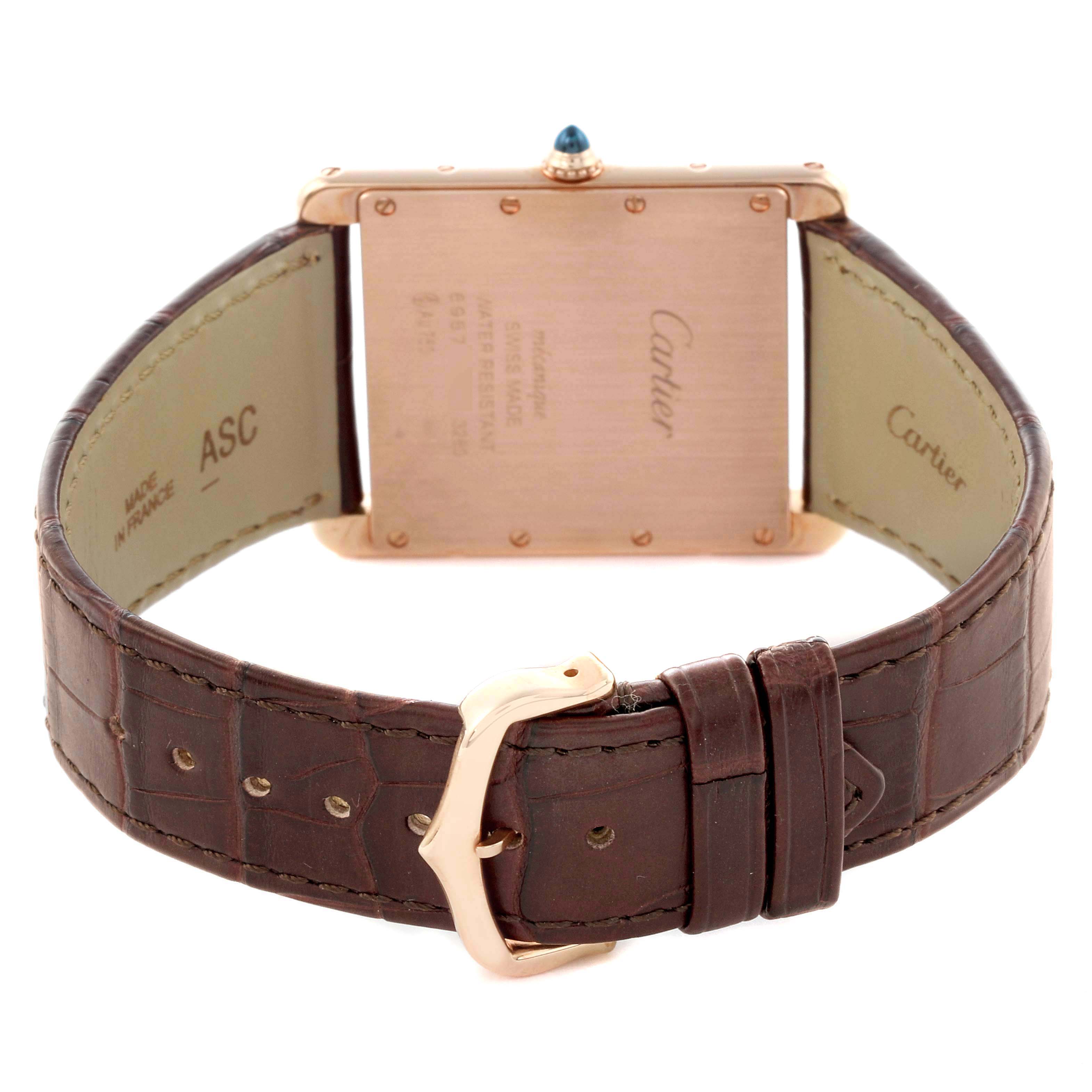 The image displays the back of the Cartier Tank Louis W1560017 Men's Rose Gold Silver Dial W1560017 Men's Rose Gold Silver Dial watch, showcasing the case, buckle, and brown leather strap.