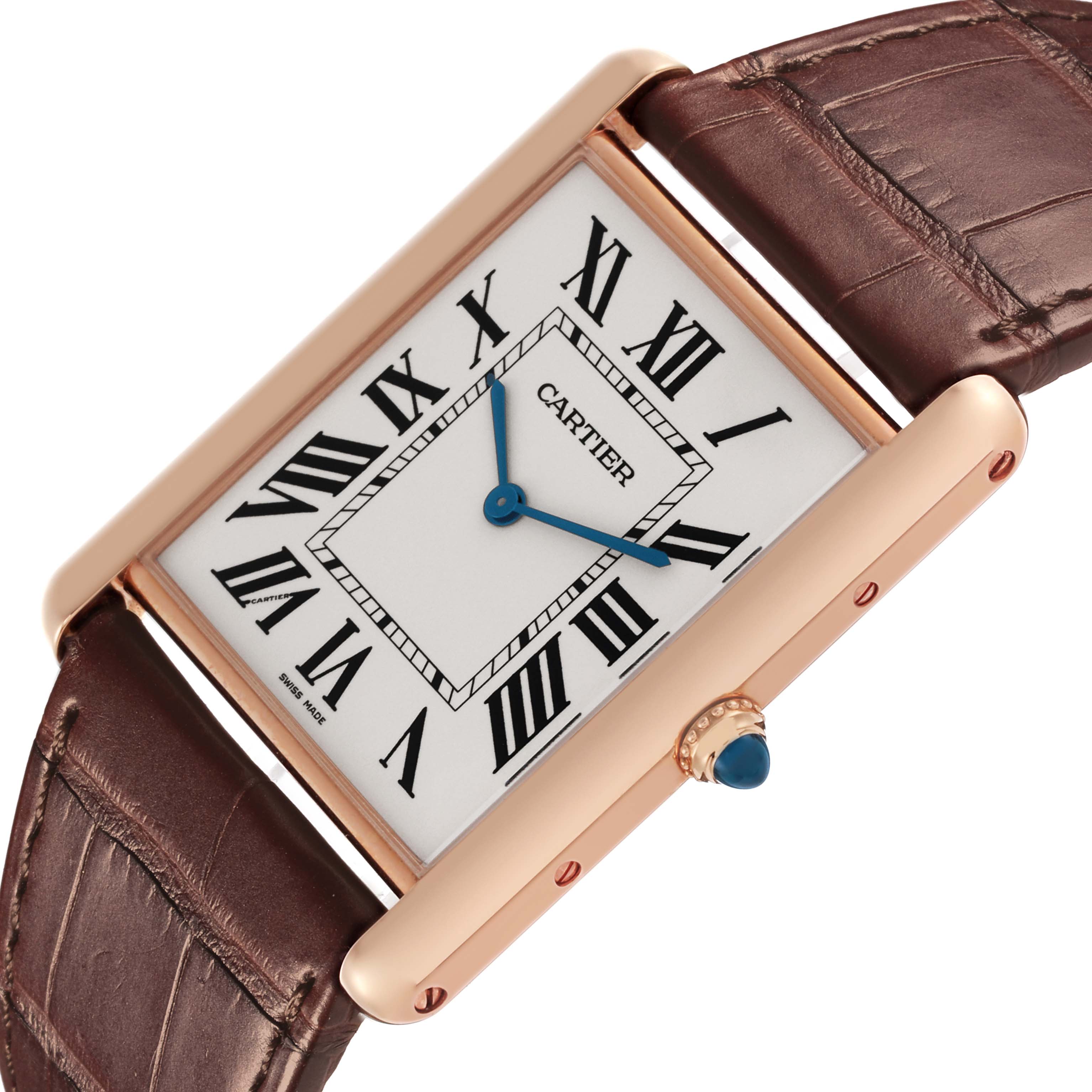 The Cartier Tank Louis W1560017 Men's Rose Gold Silver Dial W1560017 Men's Rose Gold Silver Dial watch is shown at an angled top view, displaying its rectangular face, Roman numerals, and leather strap.