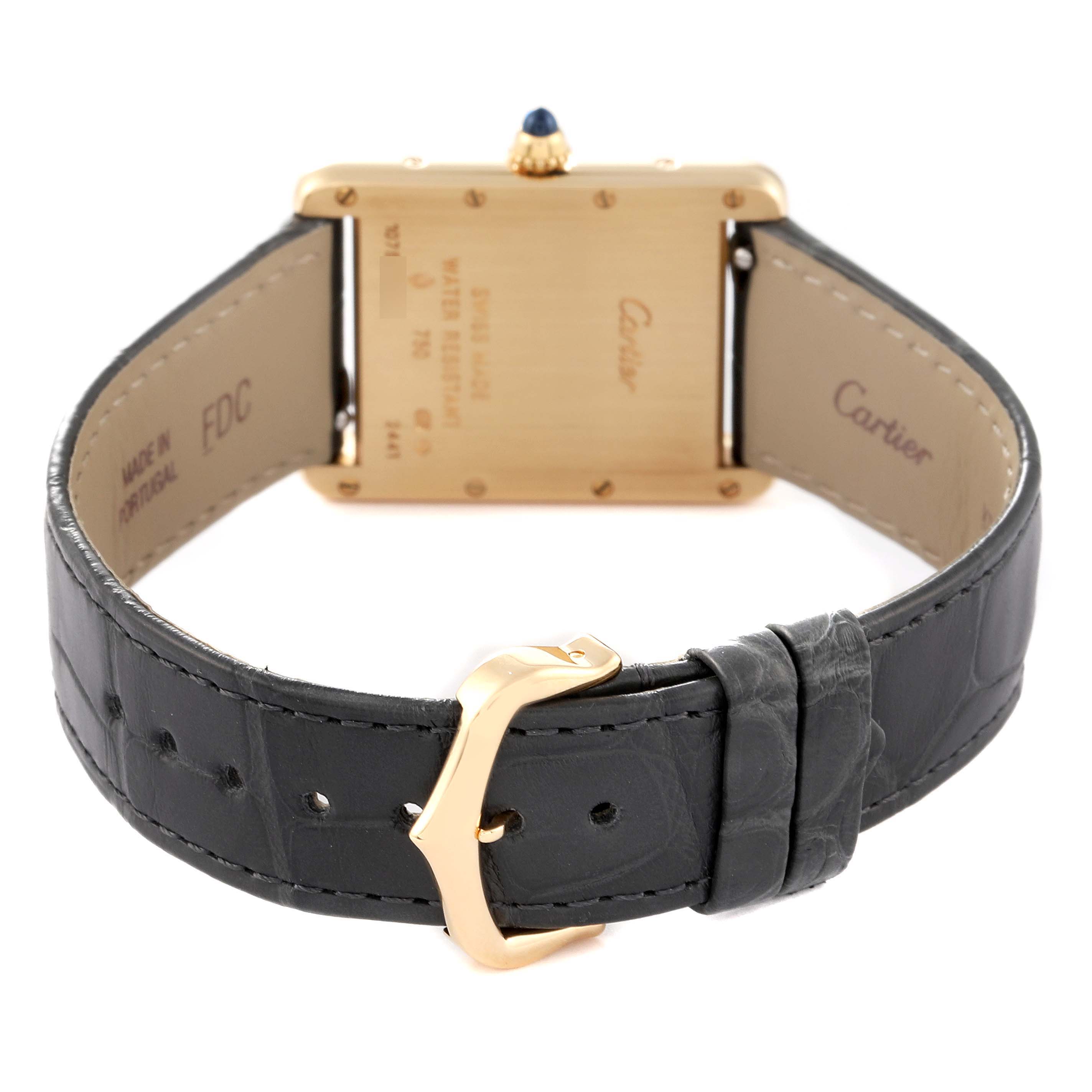 This image shows the back view of the Cartier Tank Louis W1529756 Men
s Yellow Gold Silver Dial W1529756 Men
s Yellow Gold Silver Dial model watch, highlighting the strap, buckle, and case back.