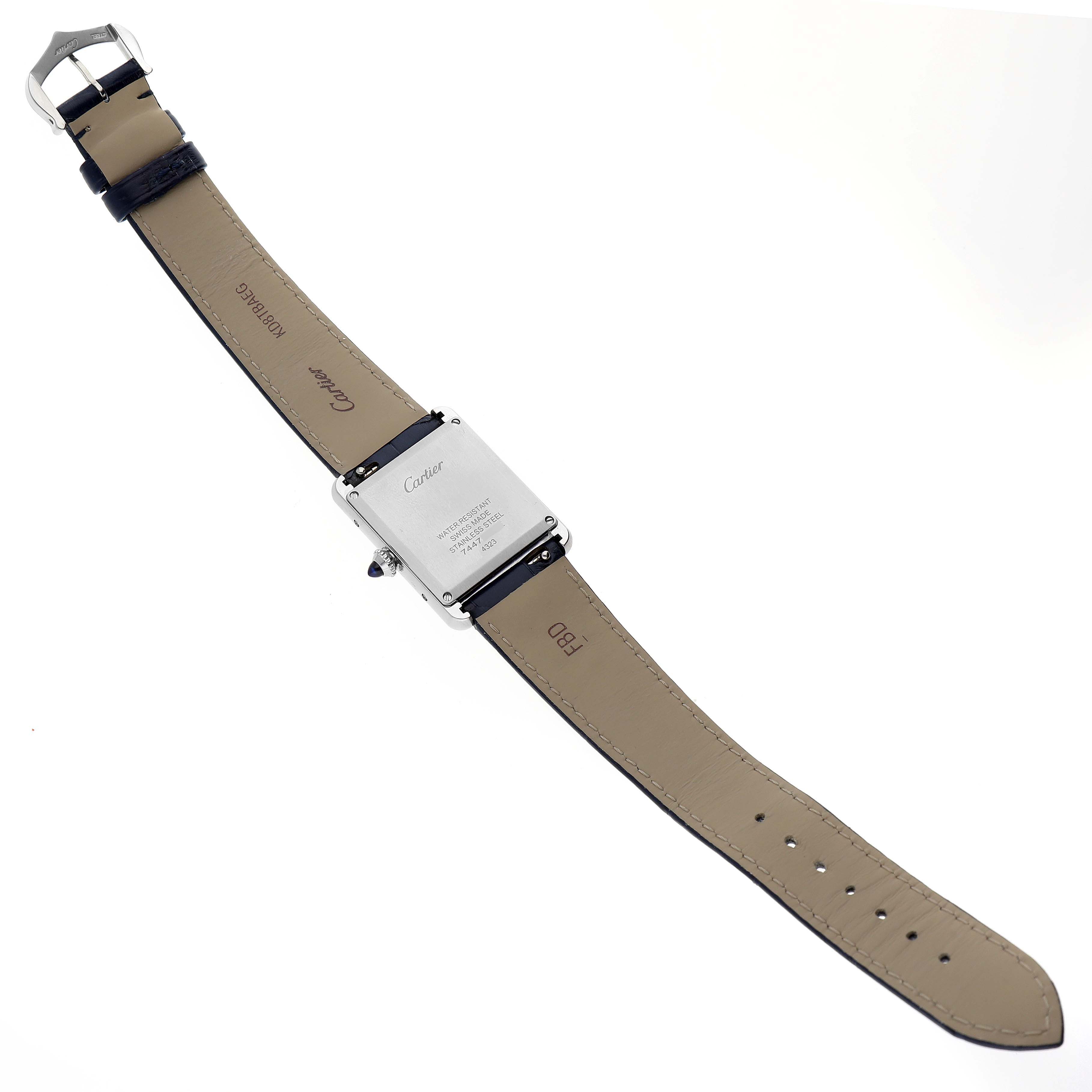 The image shows the back of a Cartier Tank Must WSTA0055 Women
s Stainless Steel Blue Dial WSTA0055 Women
s Stainless Steel Blue Dial watch, displaying its case back and leather straps.