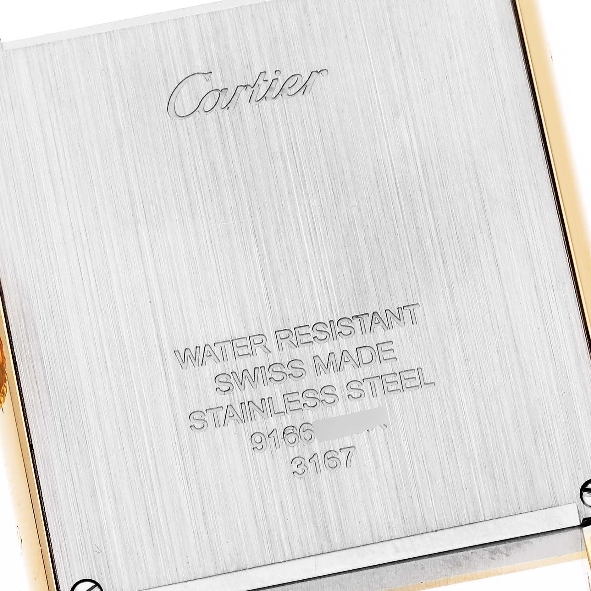 The image shows the back case of a Cartier Tank Solo W5200004 Men
s Steel and Gold (two tone) Silver Dial W5200004 Men
s Steel and Gold (two tone) Silver Dial watch, highlighting details such as "Water Resistant" and "Swiss Made."