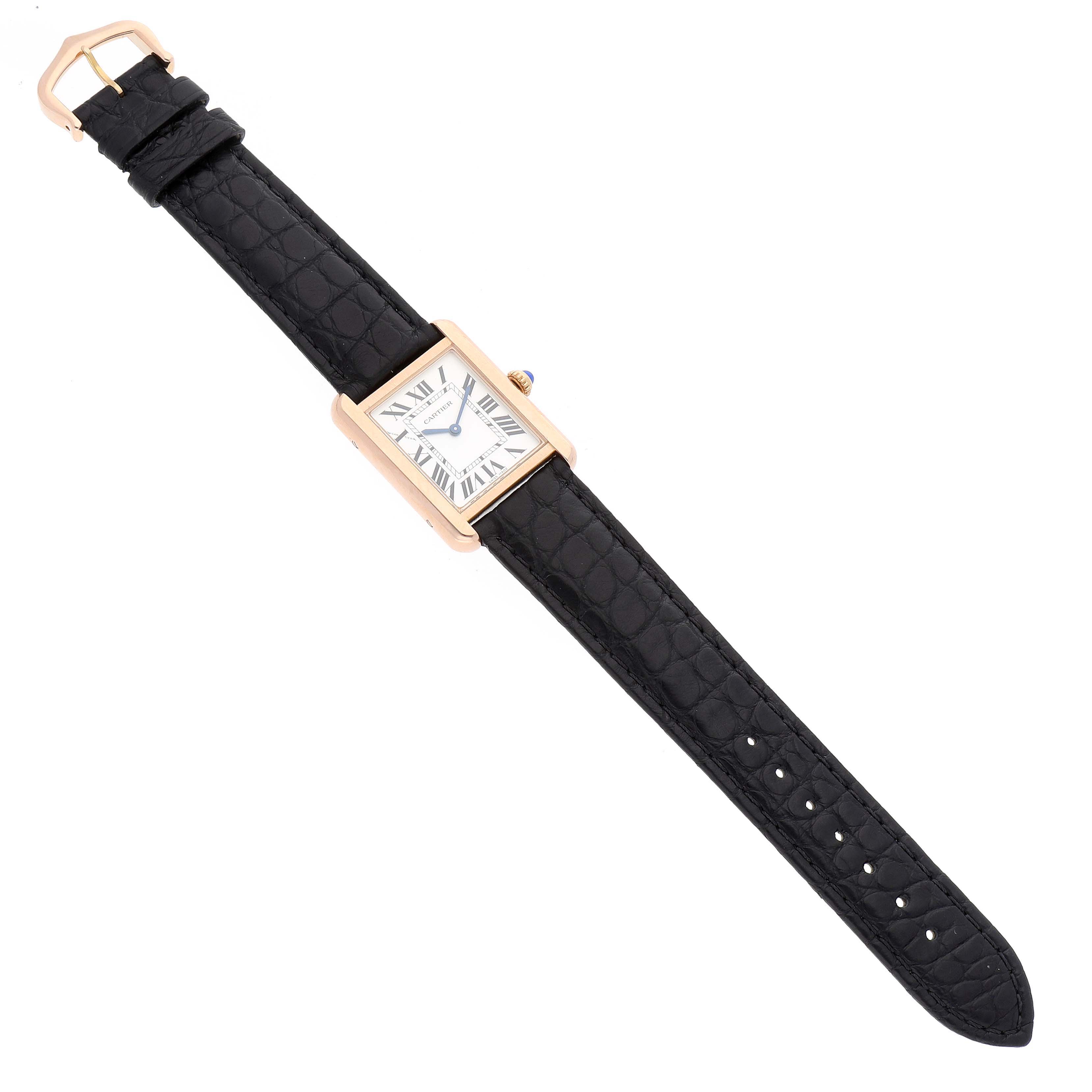 The image shows a Cartier Tank Solo W5200024 Women
s Steel and Gold (two tone) Silver Dial W5200024 Women
s Steel and Gold (two tone) Silver Dial watch from a top-down angle, highlighting its face, strap, and buckle.